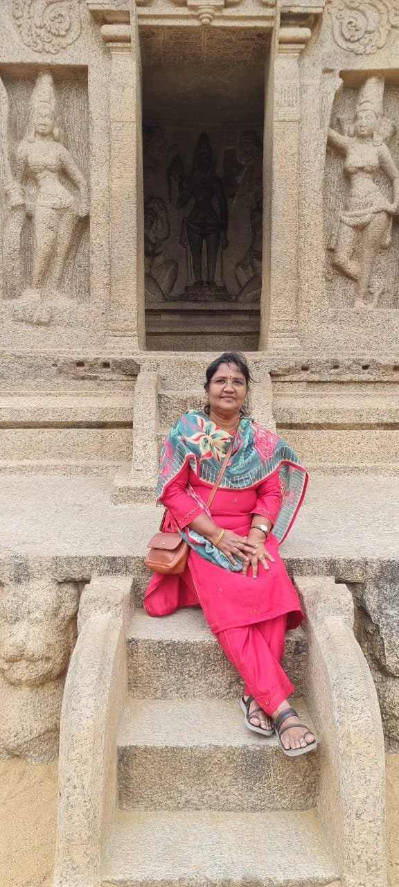 Shanthi posing solo.