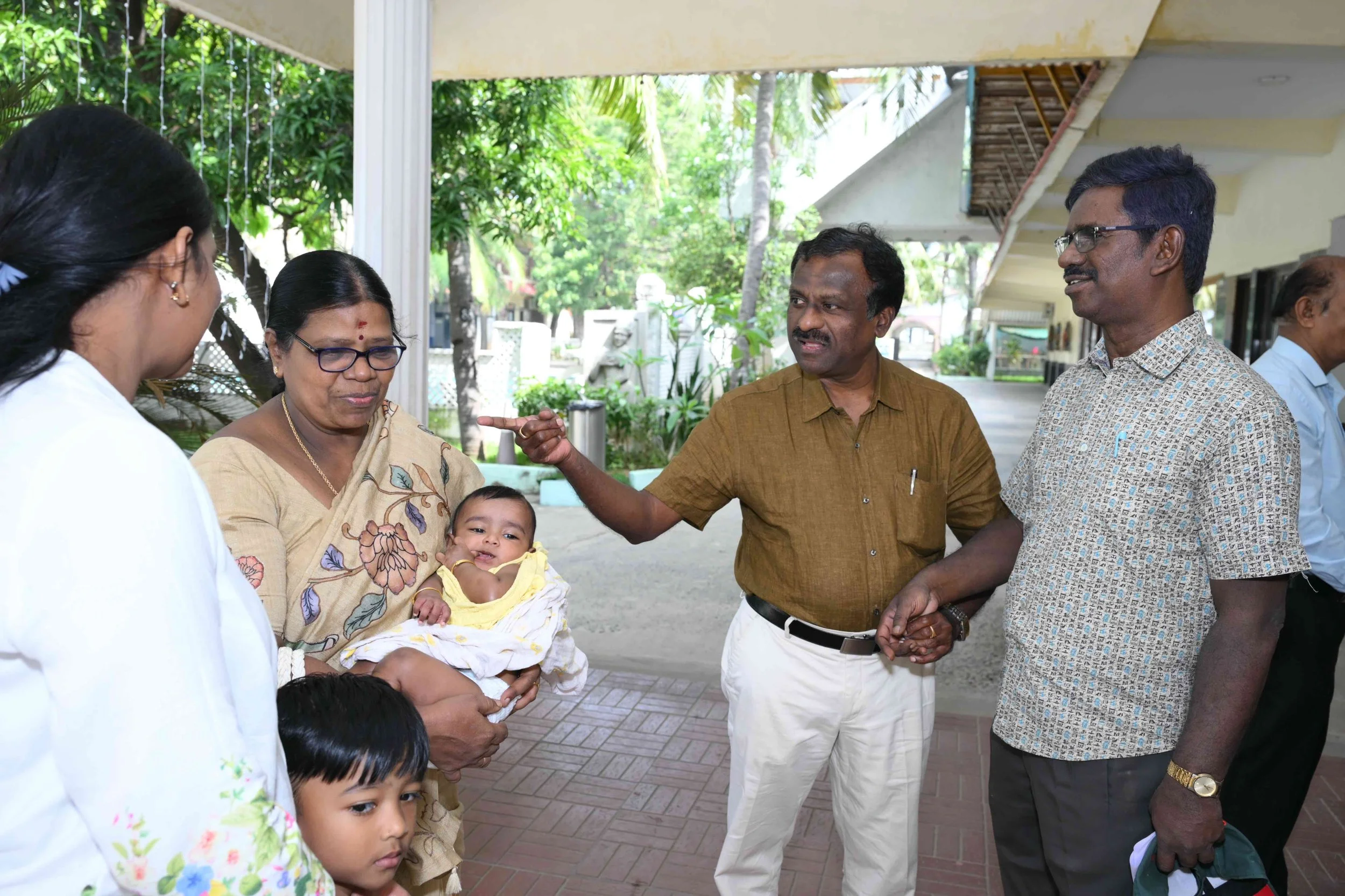 Charles meets the baby too.
