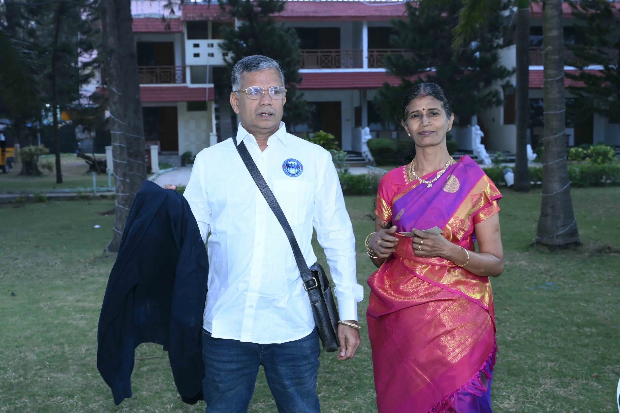 Murugean makes a splash with his wife Bharathi.