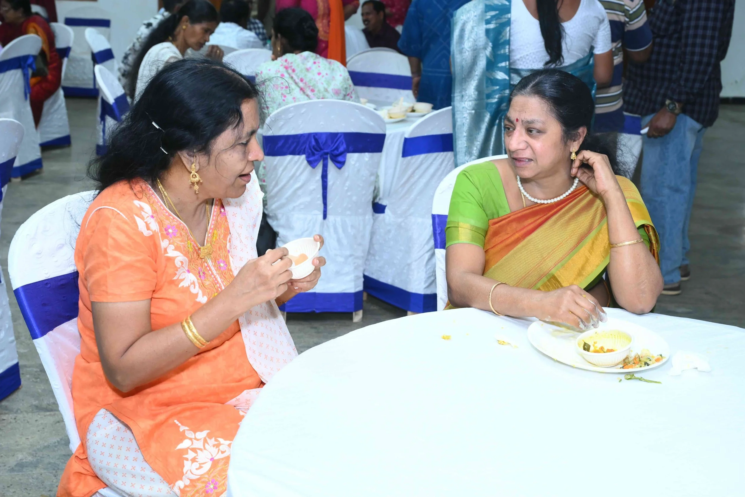 Valli and Sujatha talking about their sons as they both have two.