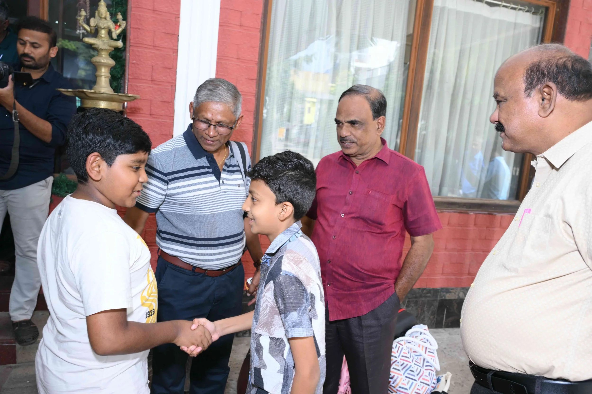 This is the best friendship to happen at this reunion (Kalimuthu's third son Dikshaanth and Tharvish's grandson Muhammed Nafeez).