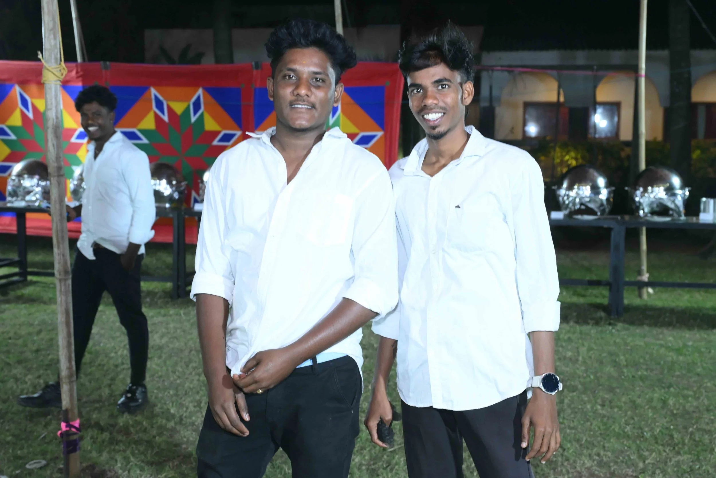 The boys are ready to serve the food.