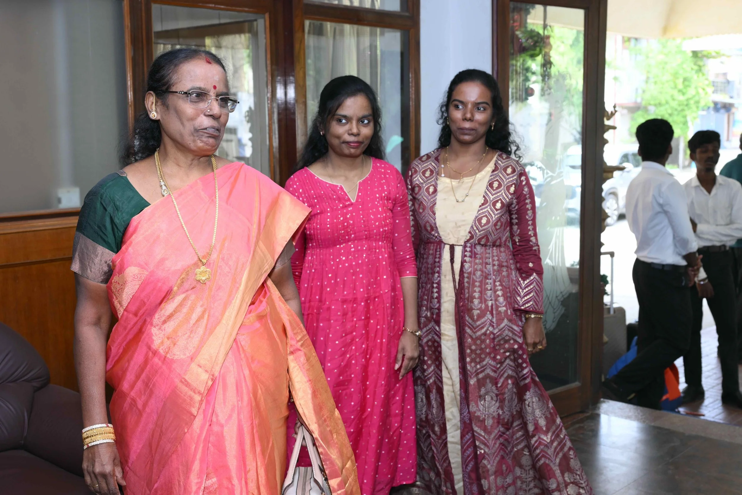 Selvapackiyam arrives with her loving daughters Anitha and Sharaniya.