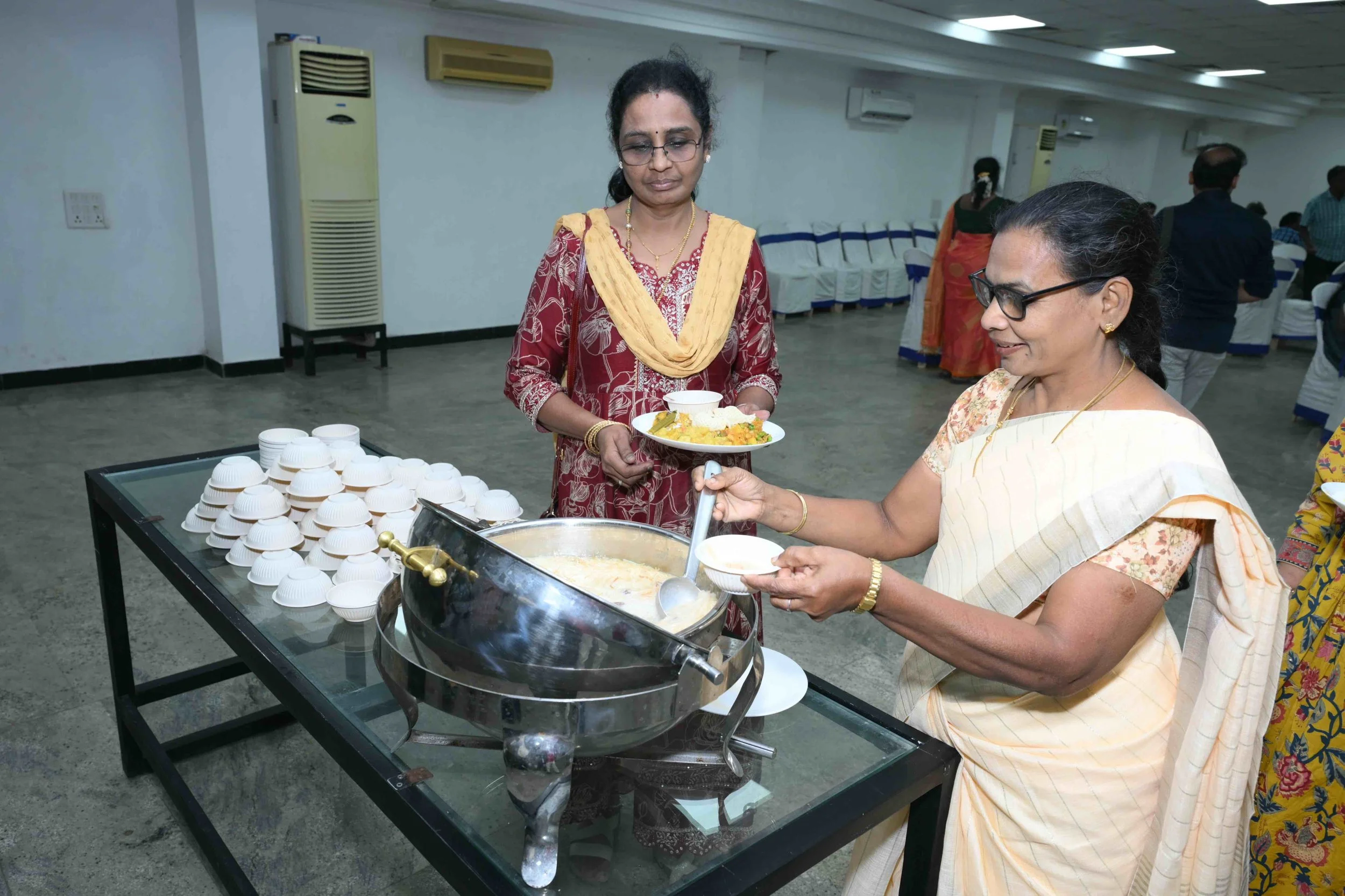 Dessert time for Usha and Celena.