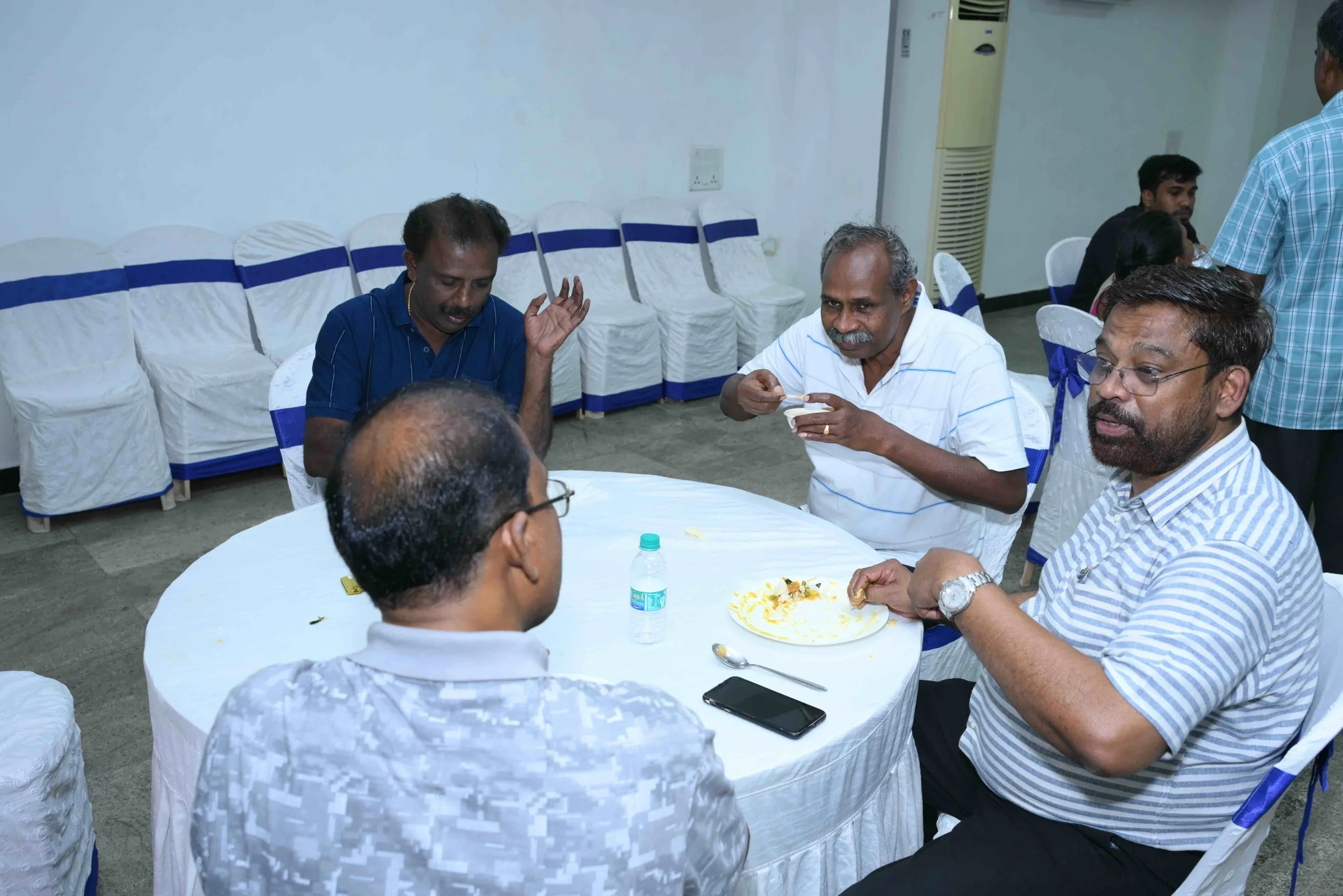 An eclectic group occupies this table.