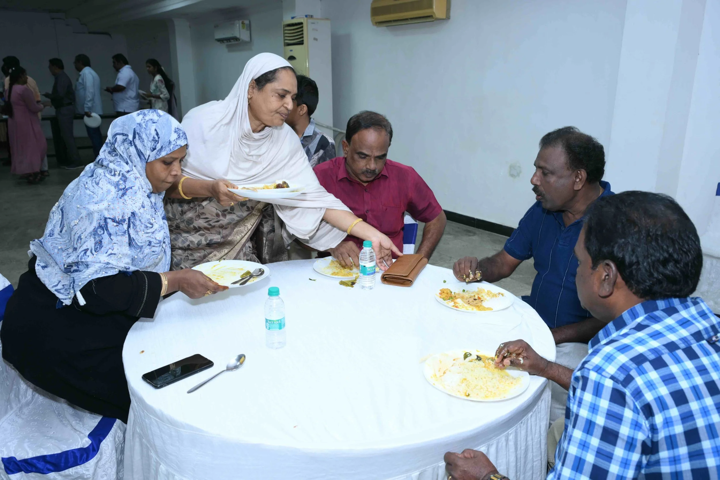 Guna and Velmurugan joining Tharvish and family for lunch.