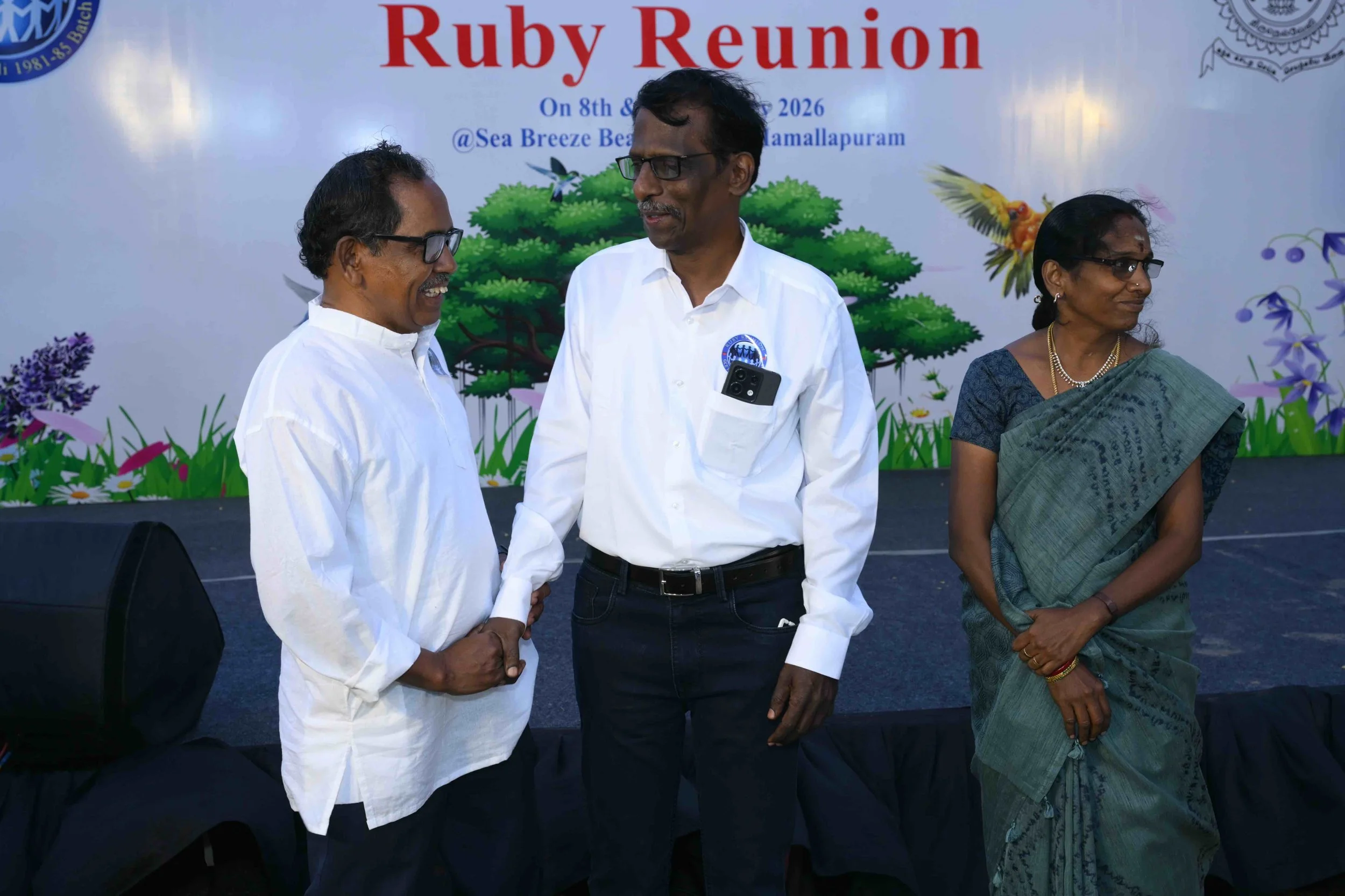 Birthday boys on stage.