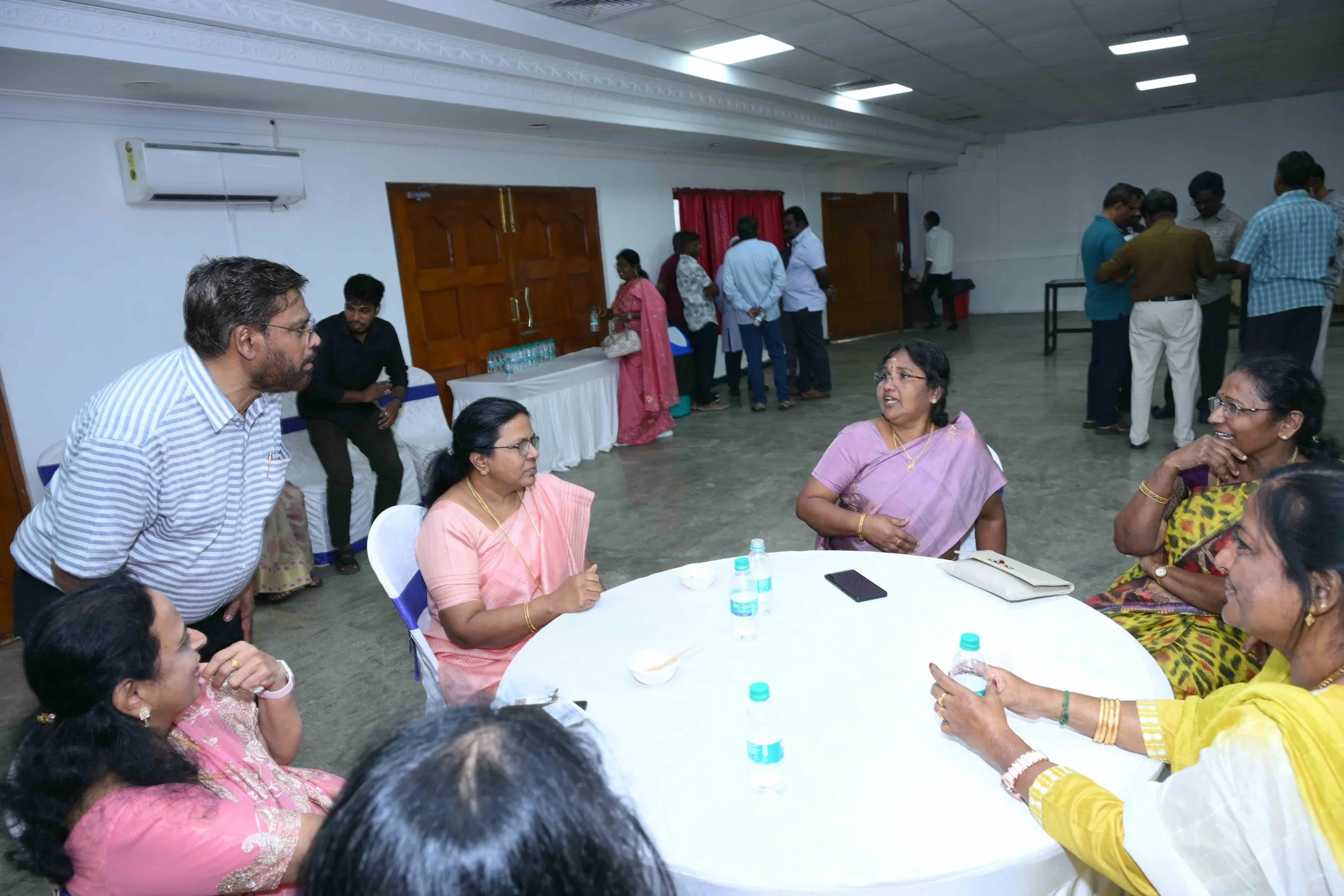 A.J the moderator of the Arattai Arangam at this table.