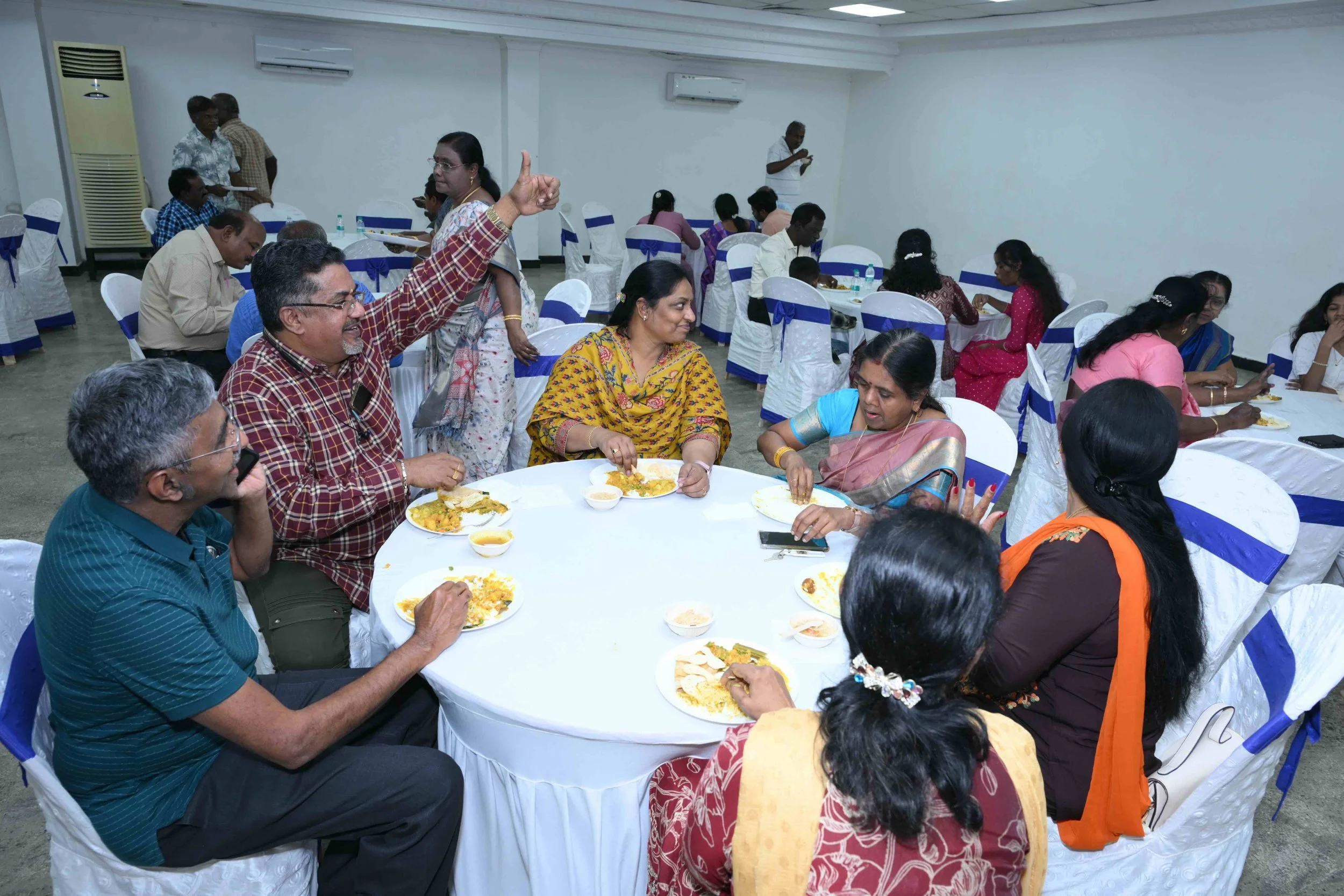 He gave a Thumbs Up for the food. Everyone can eat now.