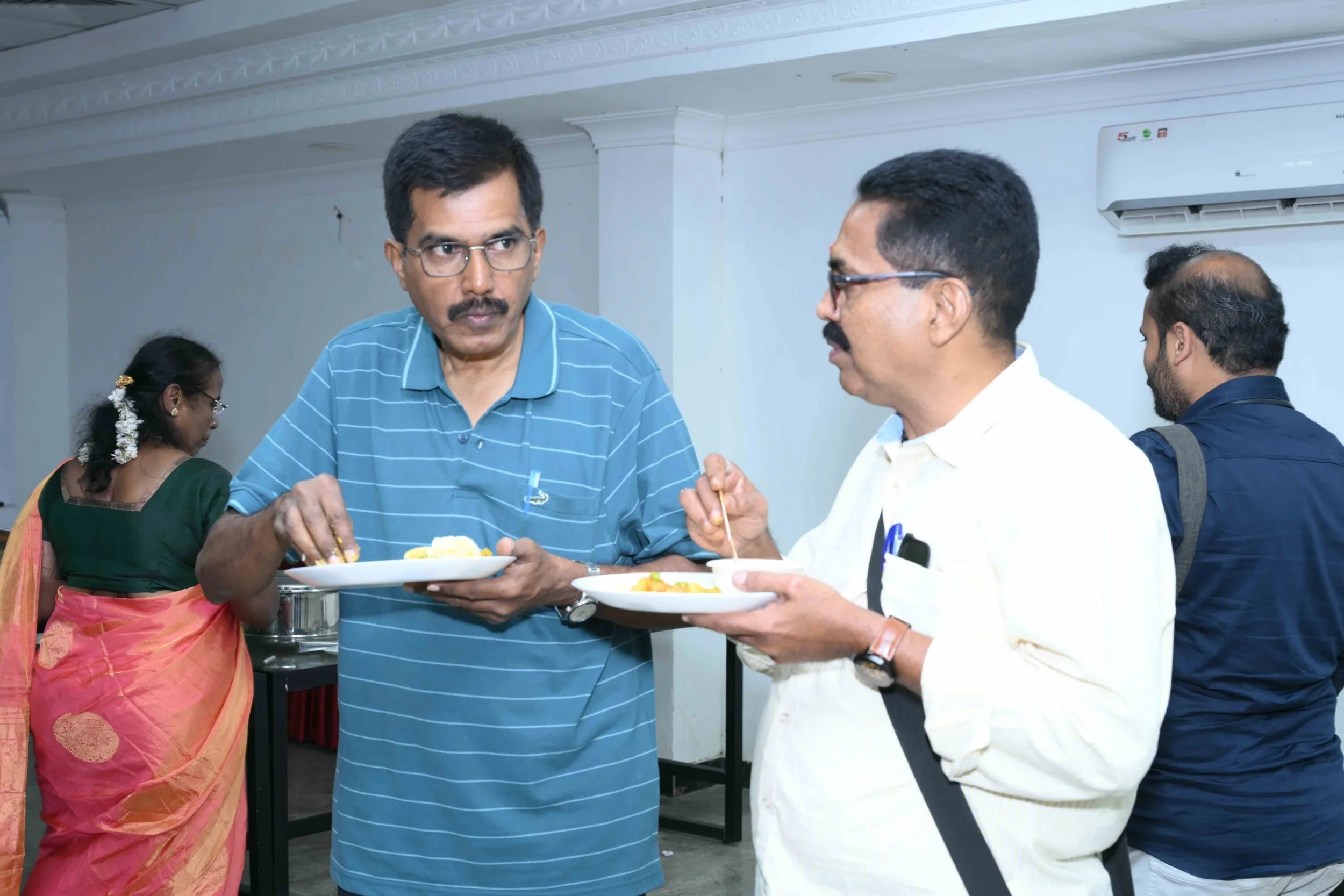 Great minds eat alike: Pedro and Sathya.