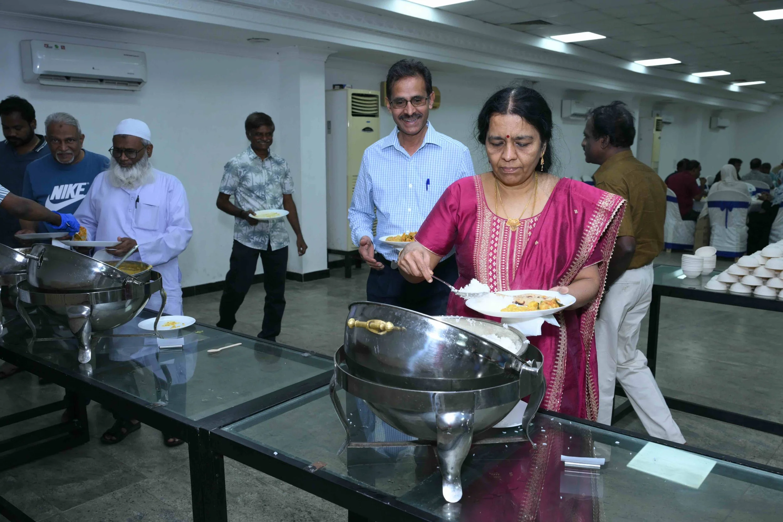 Sambandam is joyful in seeing his dear wife Valli enjoying the lunch.