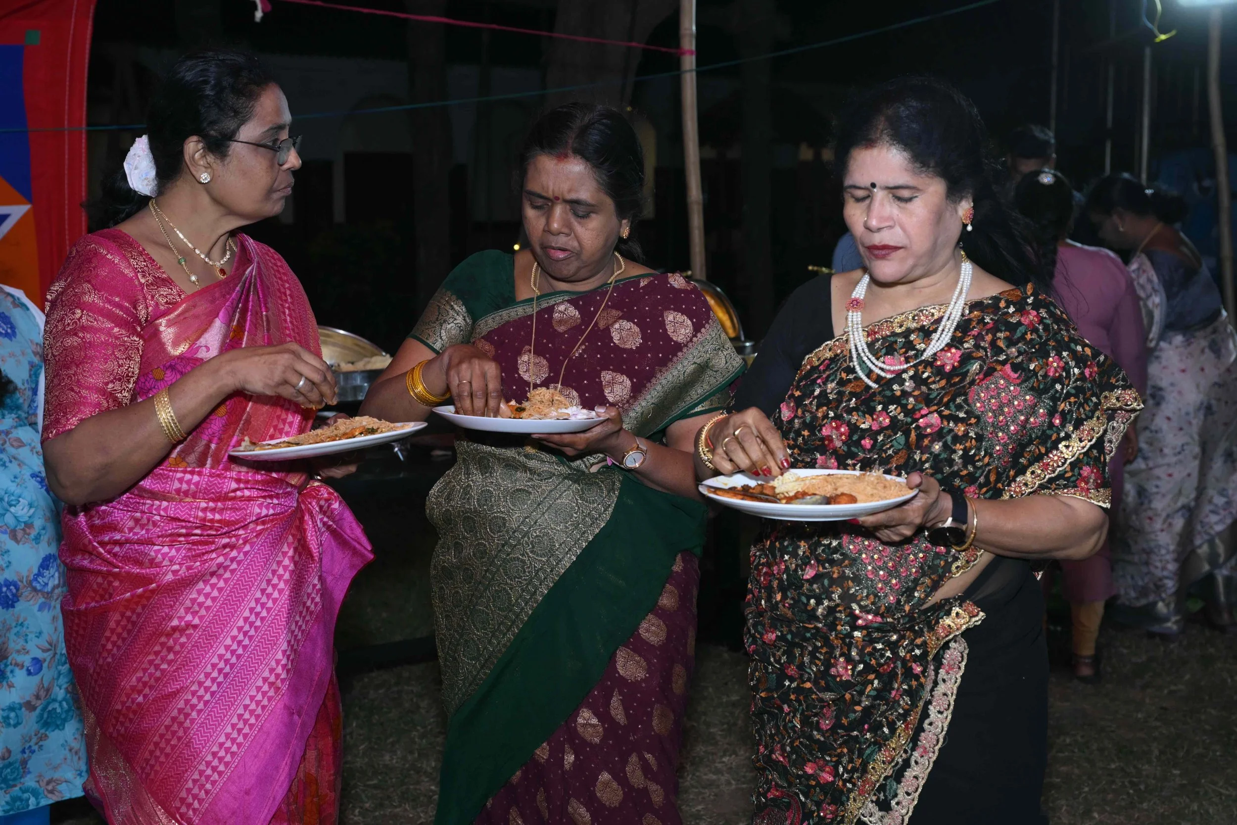Food after hard work for these three.