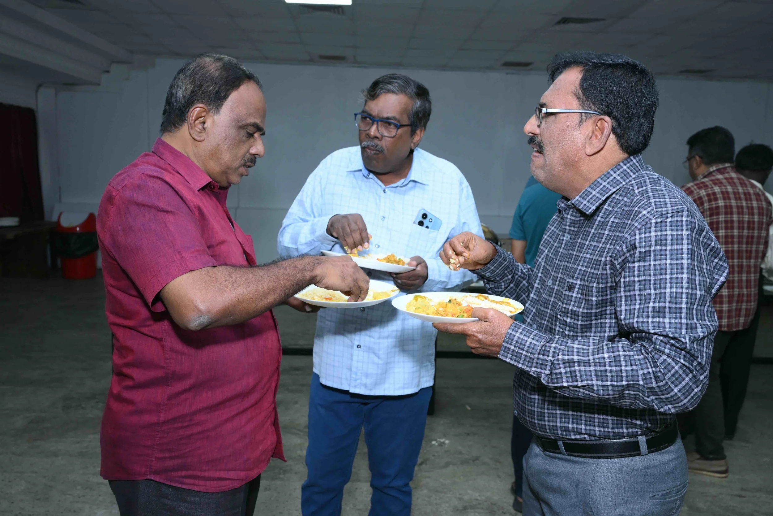 Three serious study worms being serious about this lunch.