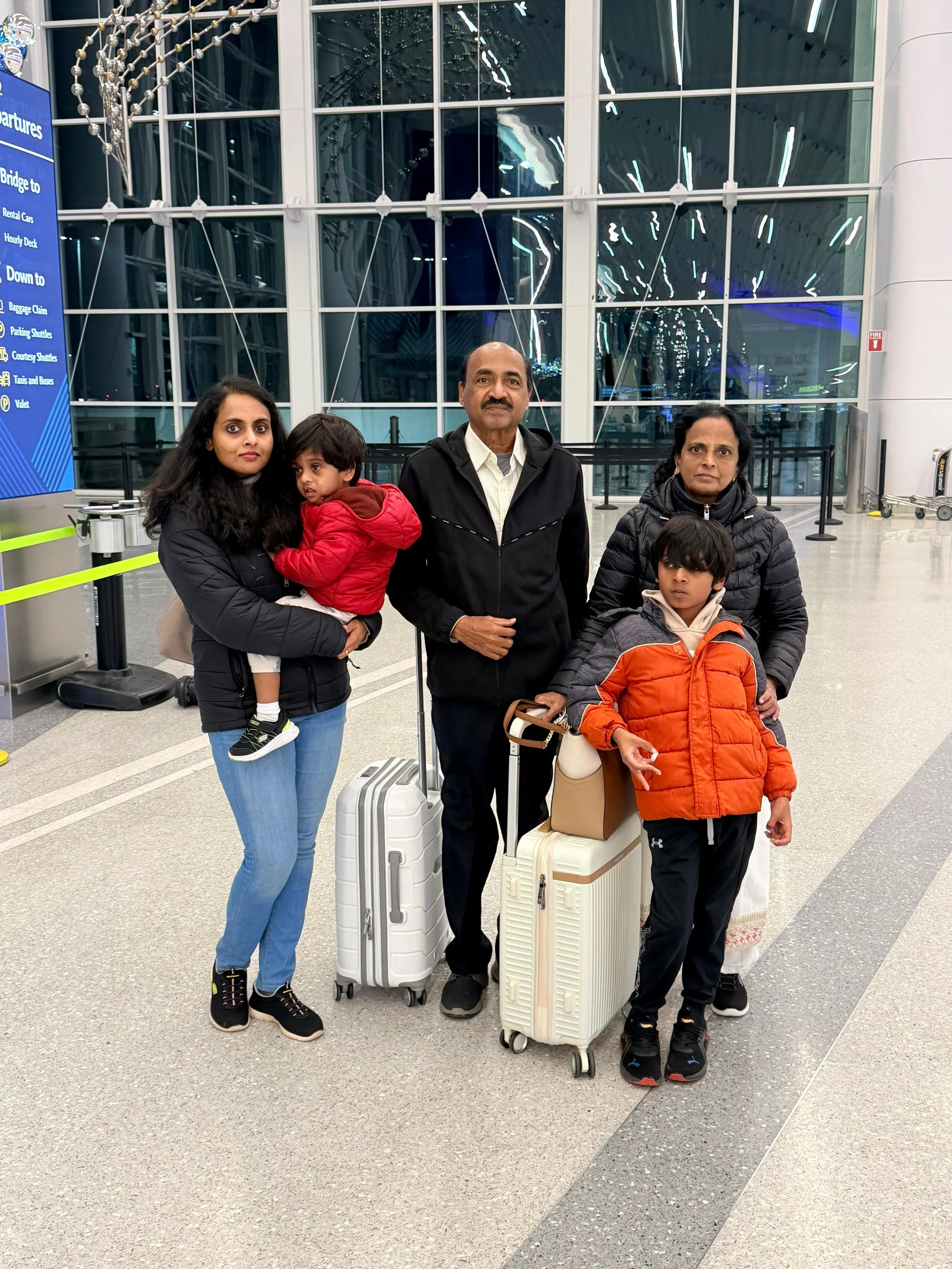 Celinerani with her loving husband Jerald, one of her daughters in Charlotte, NC and grandchildren.