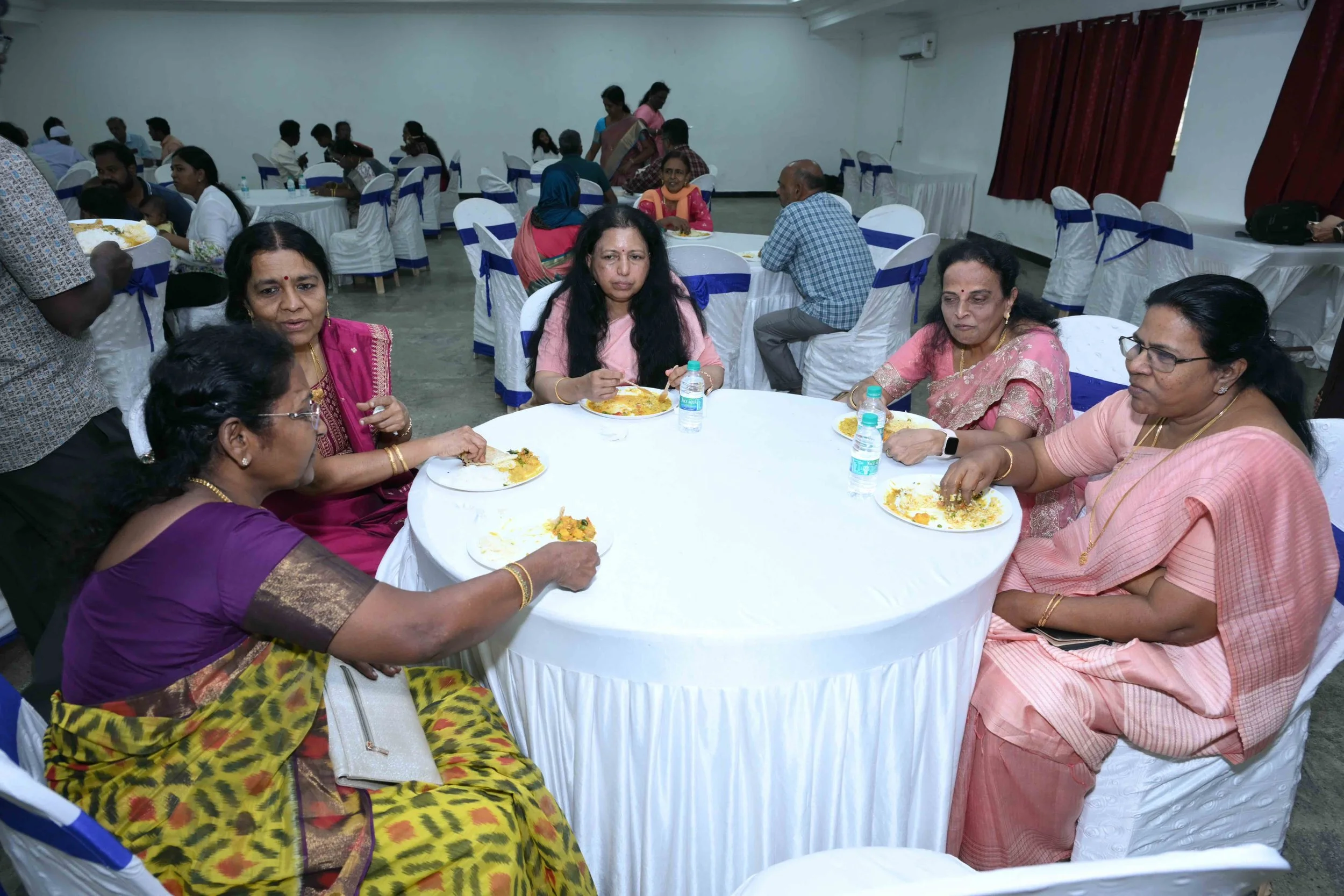 Ladies are curious about rating the chef's cooking.