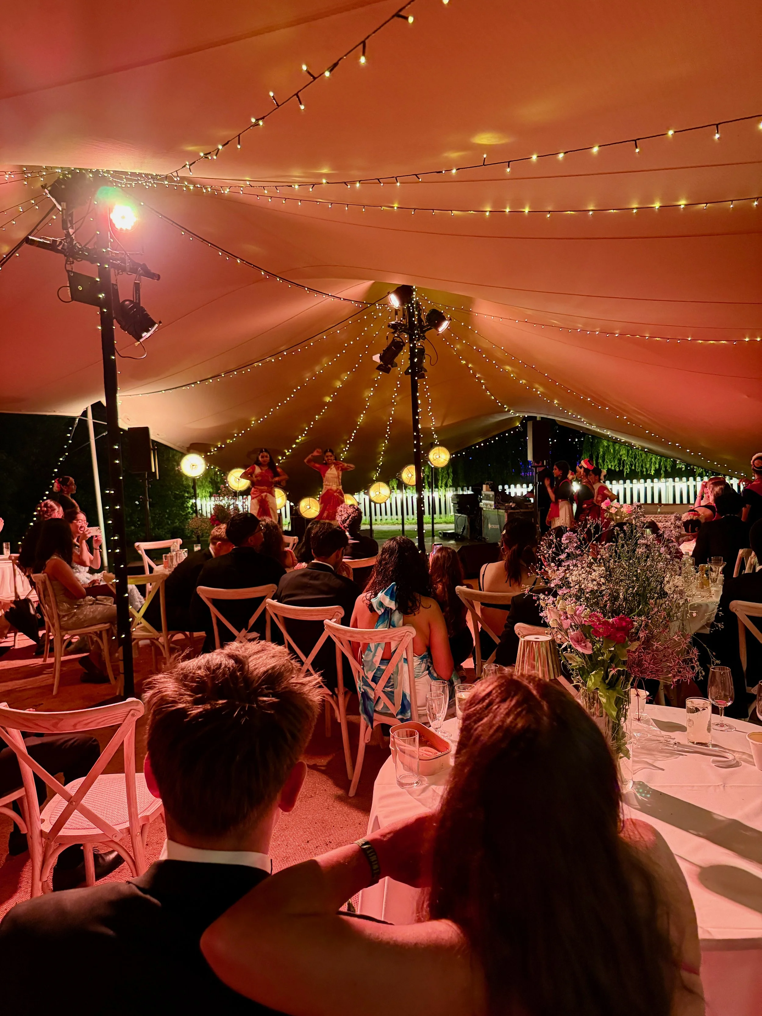 Four stretch tent structures installed by Tentickle for Trinity College Cambridge May Ball, providing covered event spaces in a historic setting