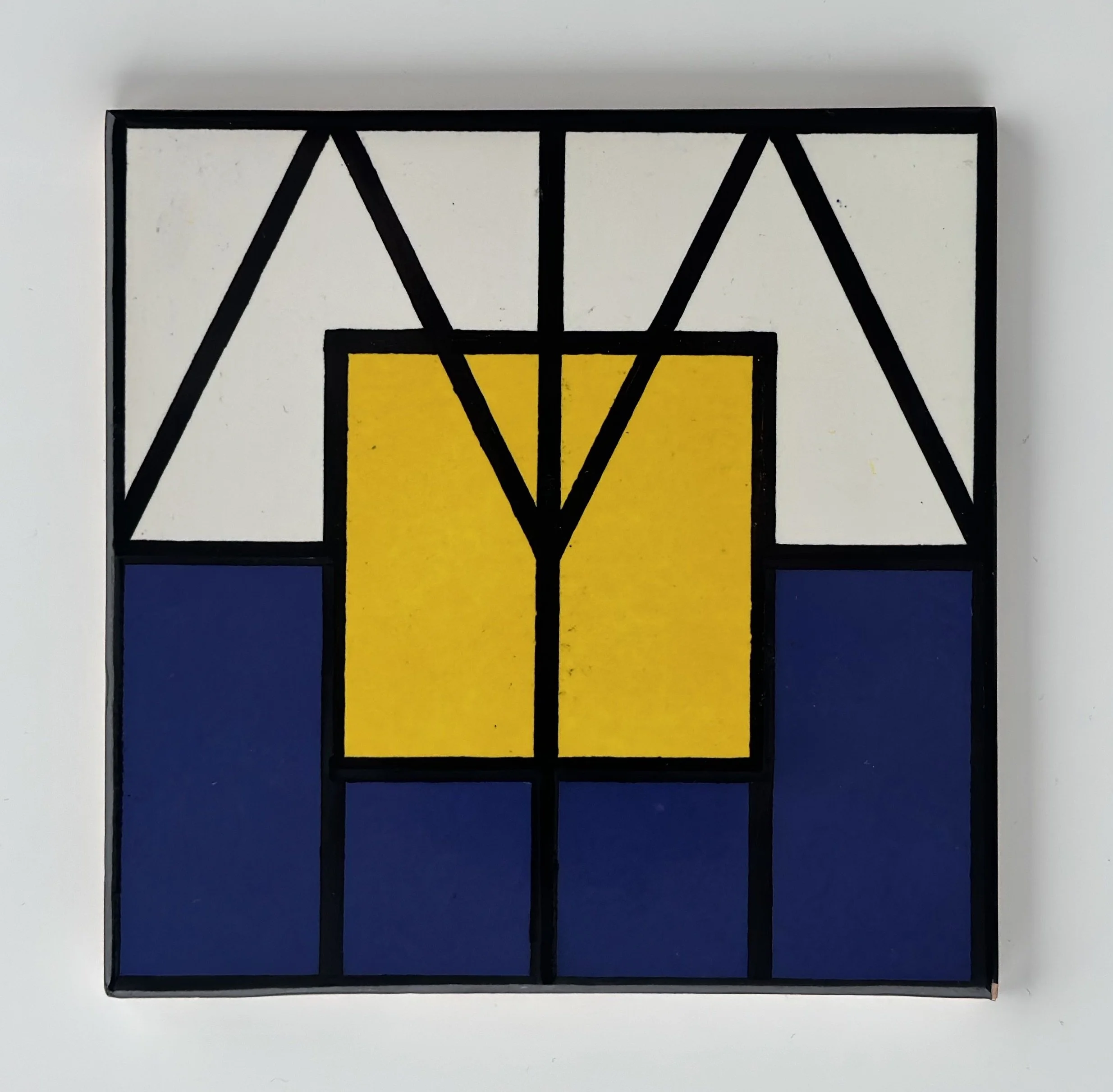 A framed abstract geometric painting with black lines forming various shapes, filled with white, yellow, and blue colors.