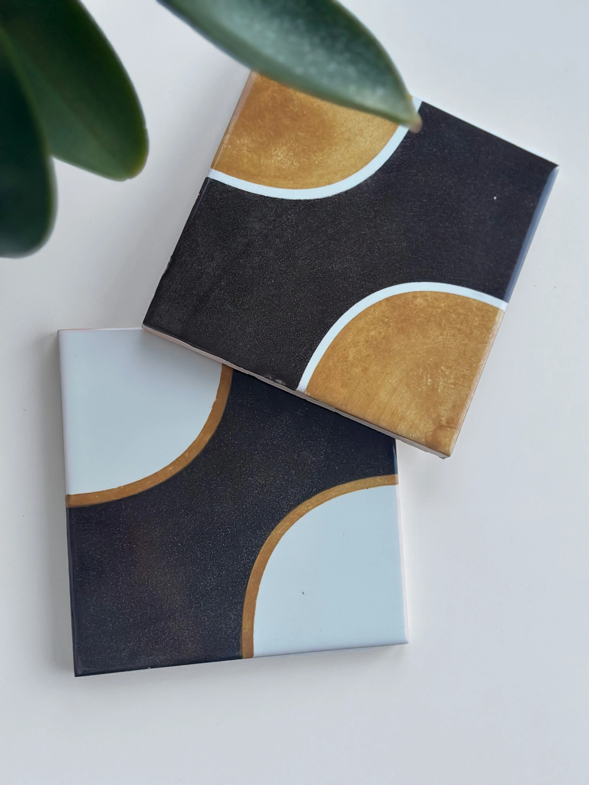 Image of two tiles from the Gion collection.