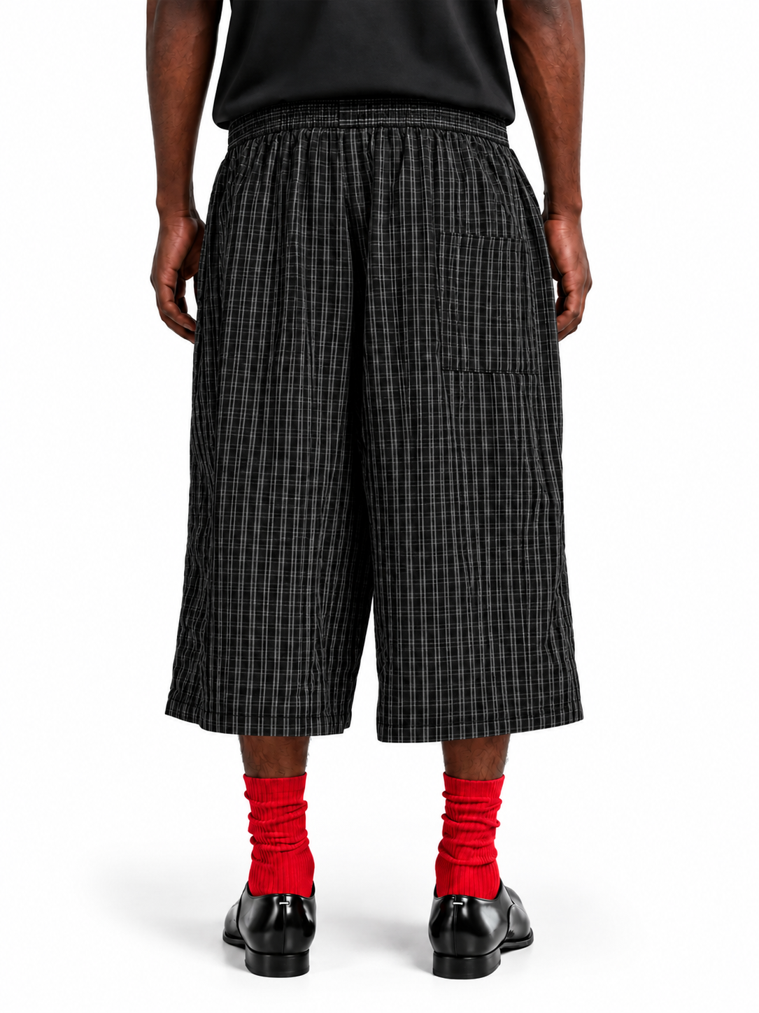 Rear-view black plaid wide-leg pants.png