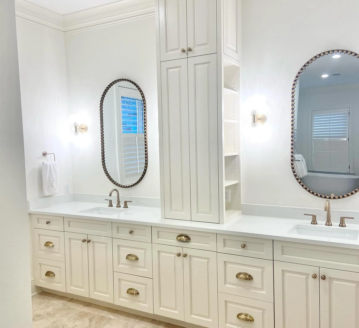 Beautiful and functional! ✨🤩 adding the open shelving with outlets on the sides of the upper cabinets creates more useable space! 
.
.
.
.
.
#interiordesign #bathroomdesign #before #after #renovation