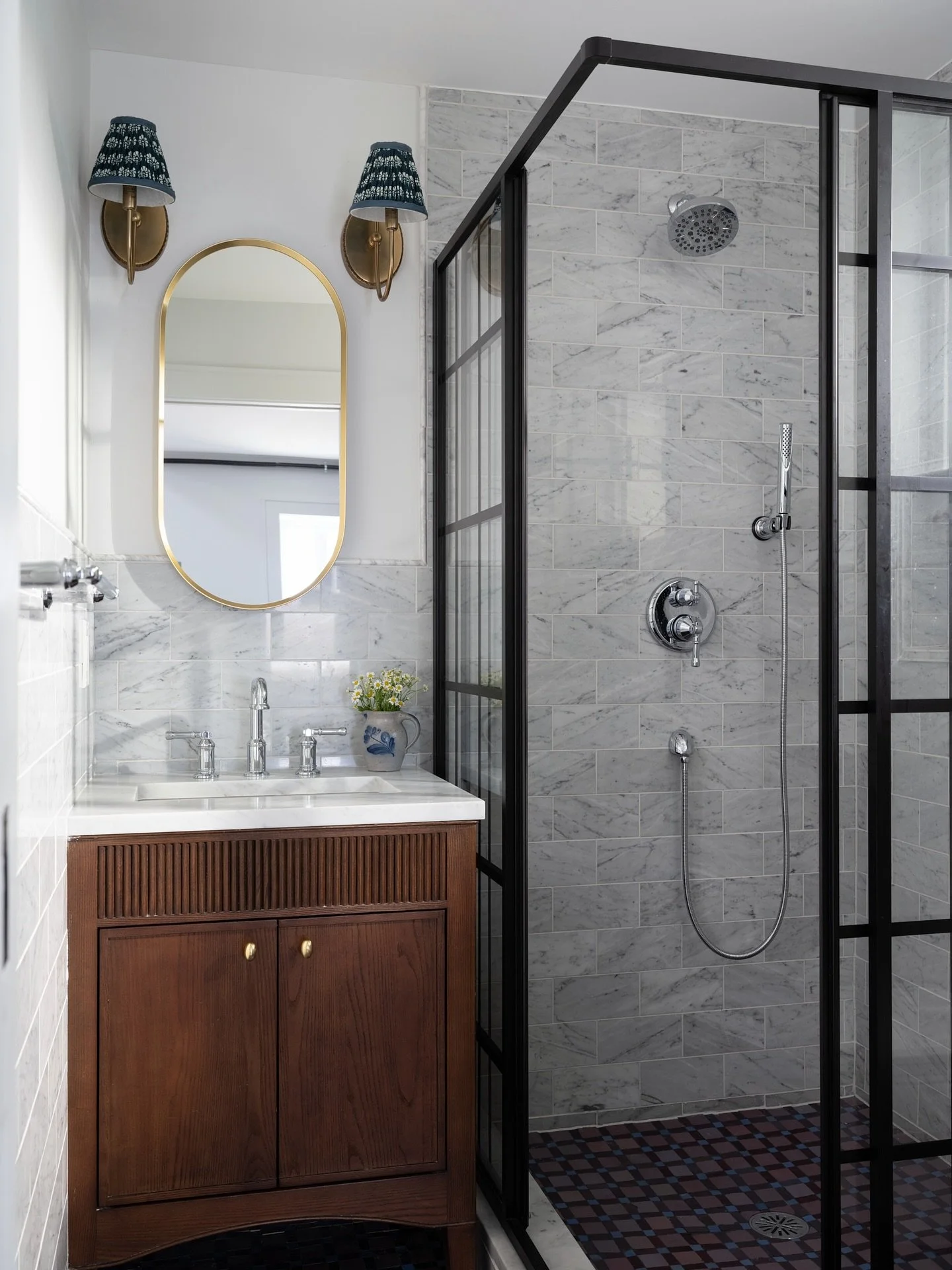 If we&rsquo;re carving a full living experience out of a small ADU, the bathroom can&rsquo;t feel like an afterthought. It has to pull its weight.

In the Brookland Carriage House, we were working with a tight footprint but still needed this space to