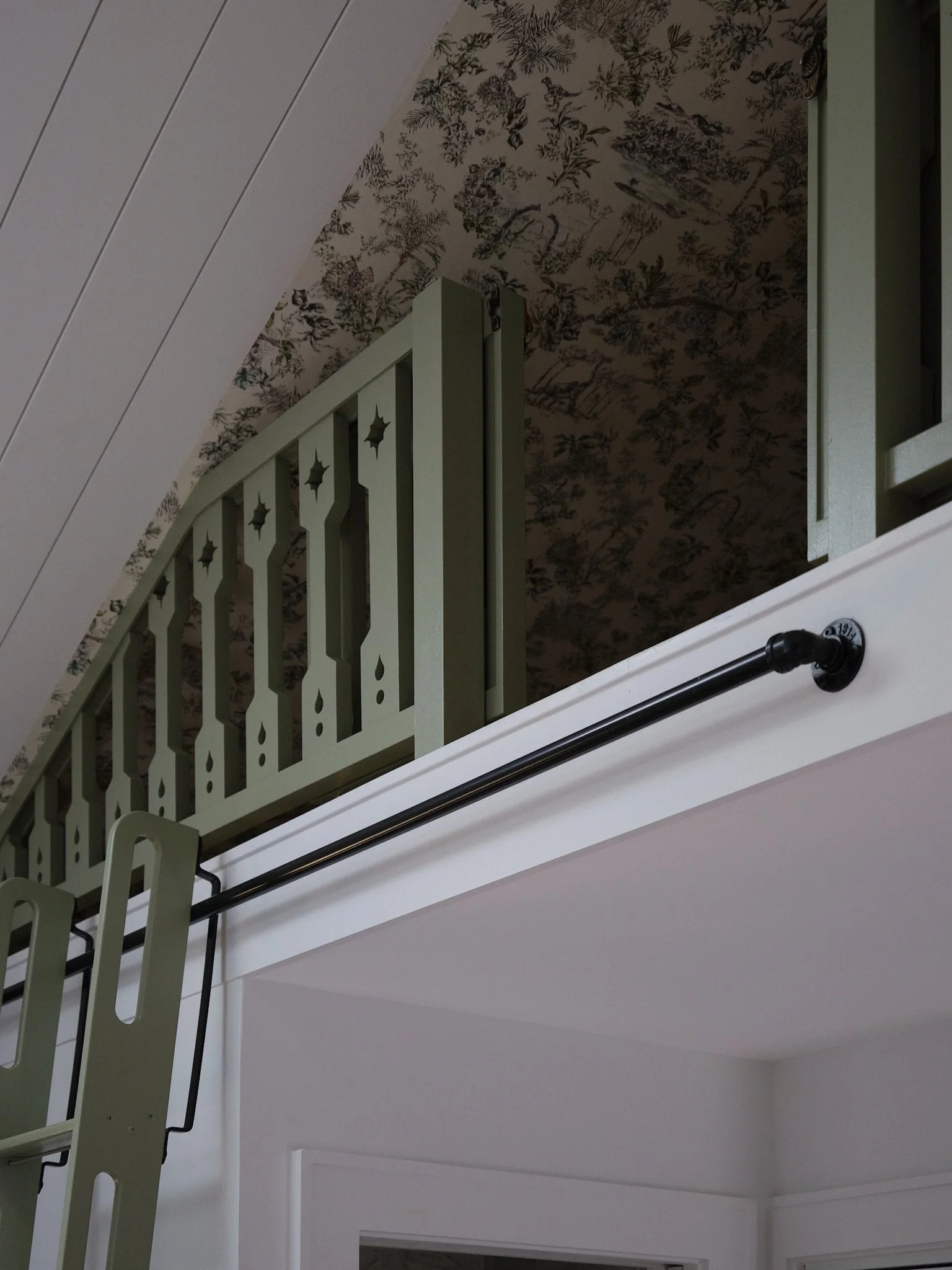 Jurassic Park wallpaper. Need I say more.

Every part of this project has its moments, but the loft definitely takes the cake. It&rsquo;s tucked up above everything else, so it already feels a little like its own world up there. The wallpaper just le