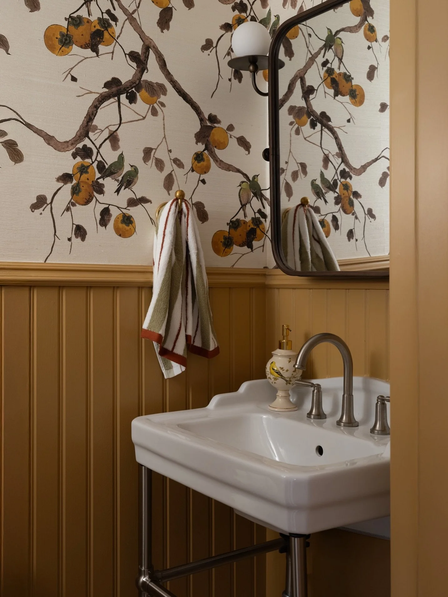 This powder room used to live somewhere else in the house, tucked away and a little disconnected from the rest of the main floor.

We moved it into the center of the home so it actually works with how the house is used day to day, and it also gave us