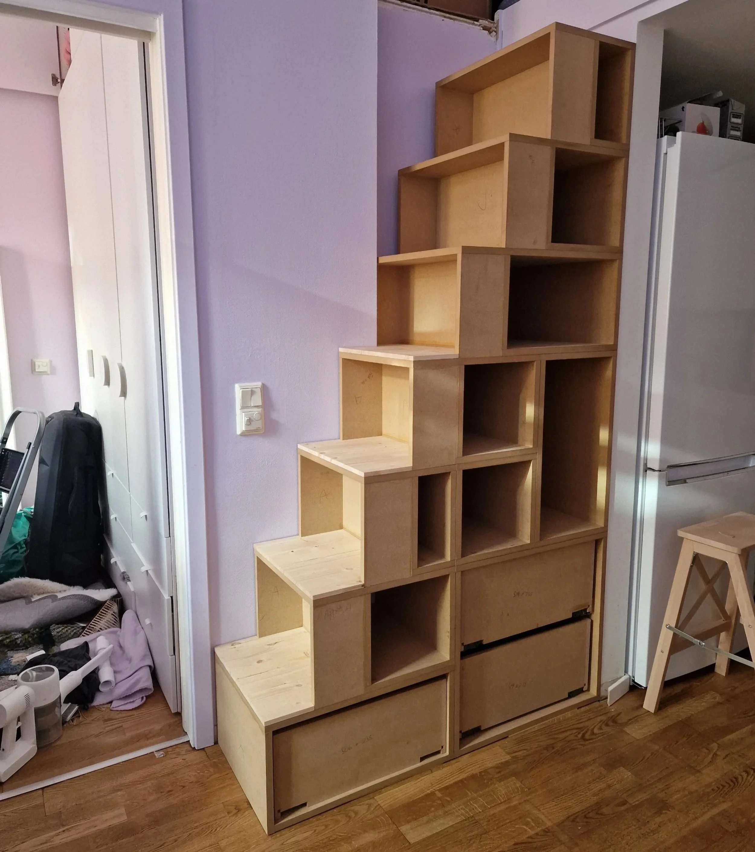 Custom Space-Saving Loft Stairs With Whimsical Storage