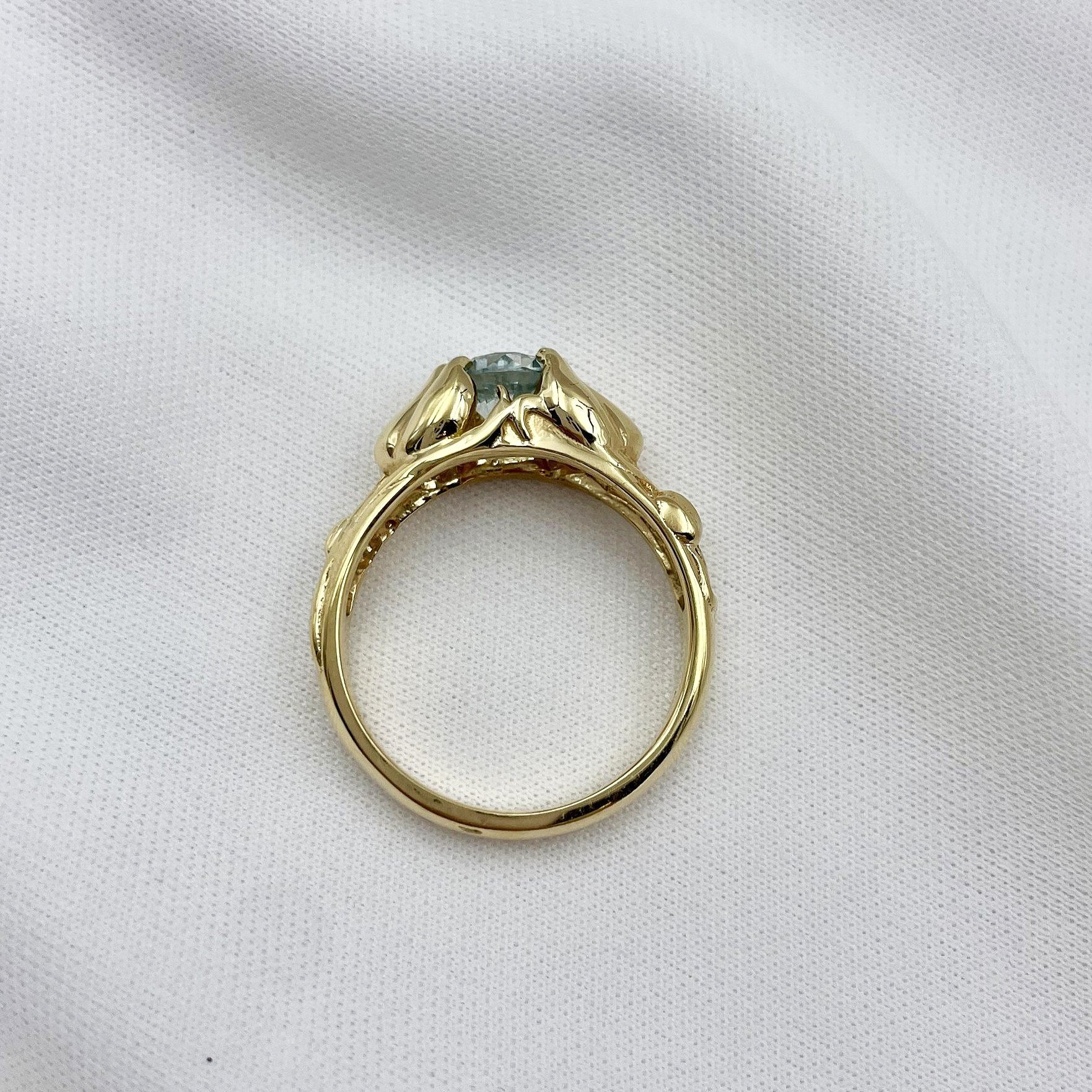 side gallery view white background Blue Zircon 6mm Round Floral Ladies 14K Yellow Gold Ring
