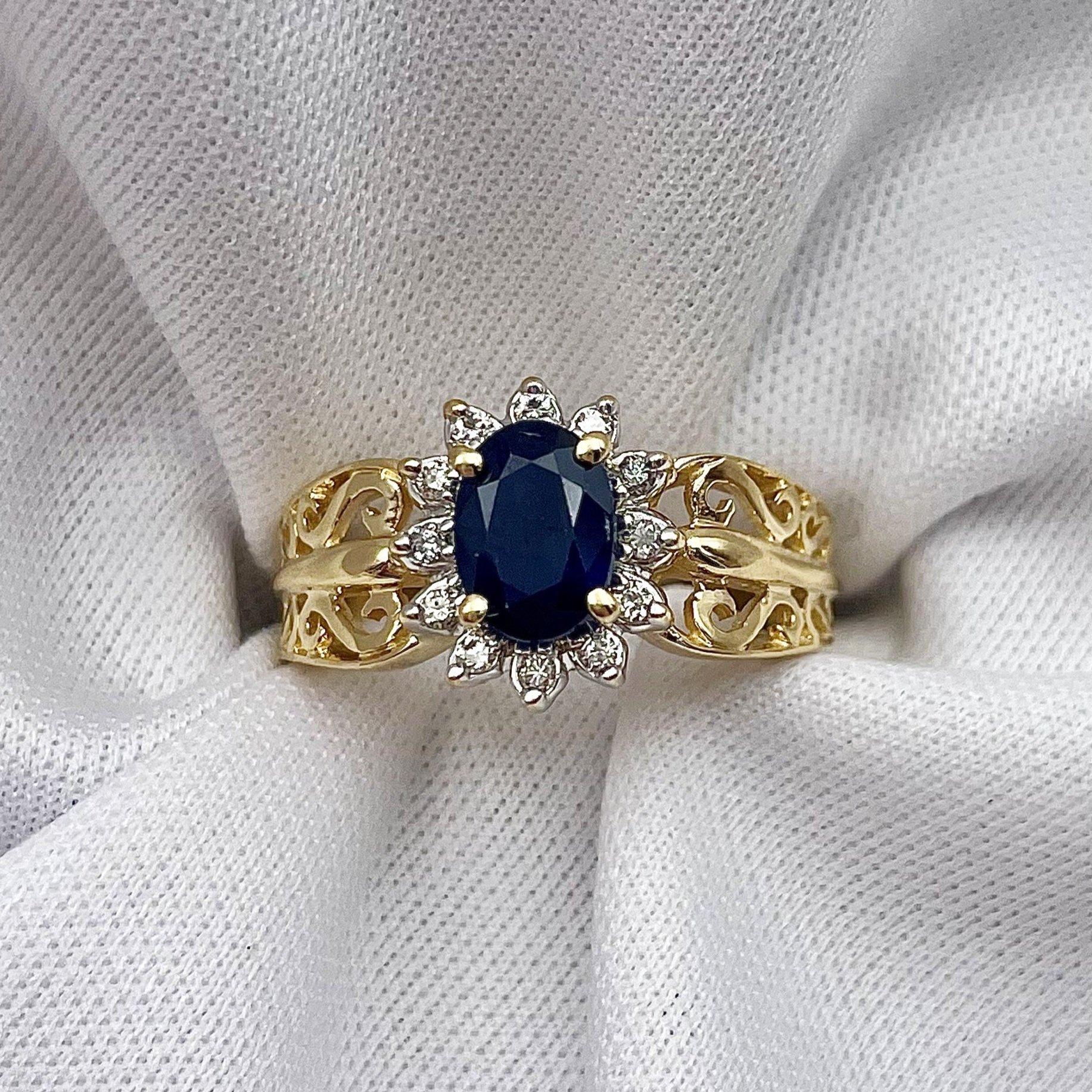 top down white background 14k Yellow Gold Oval Sapphire With Diamond Halo Filigree Ring