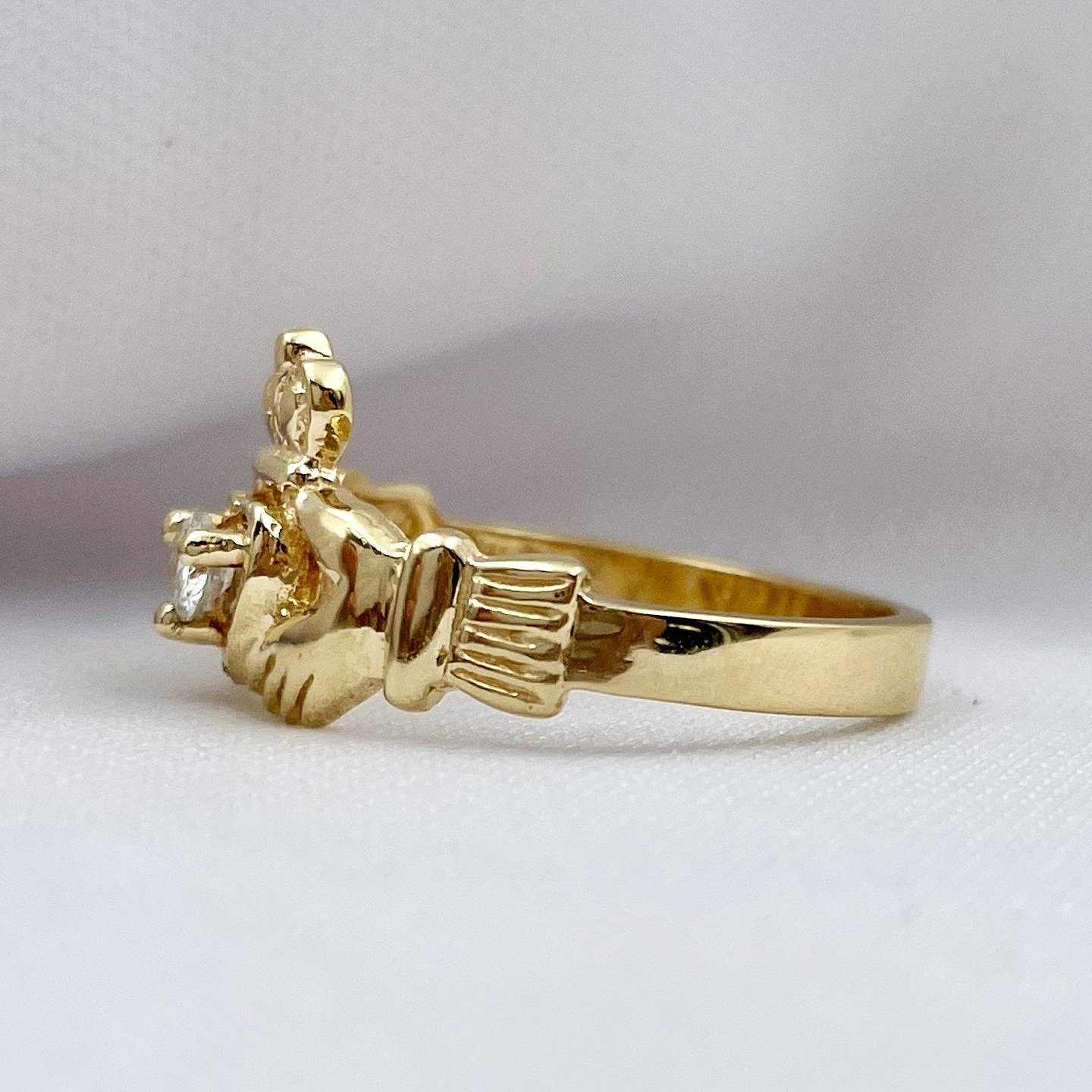 side view white background 14k Yellow Or White Gold .11ct A Quality Diamond Claddagh Ring