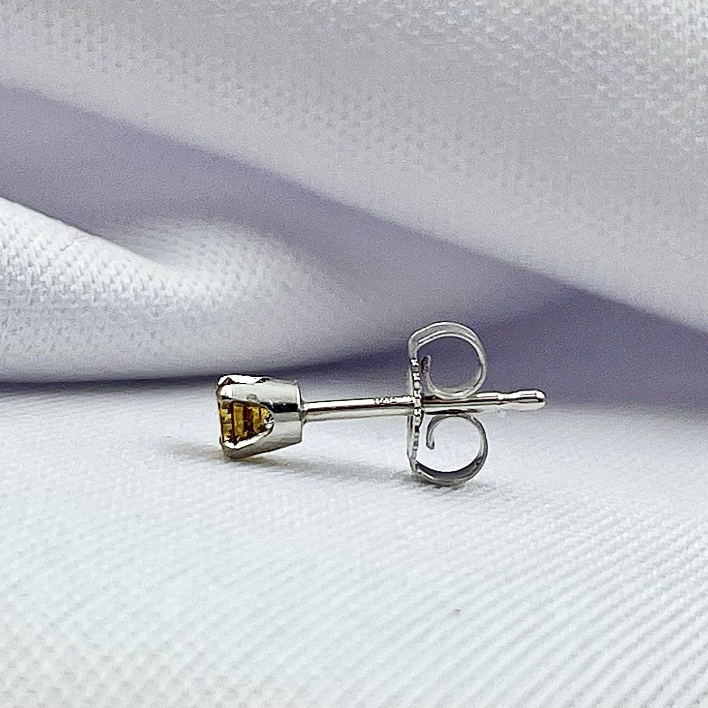 side view white background .22ctw Orange Diamond Stud Earrings 14k White Gold