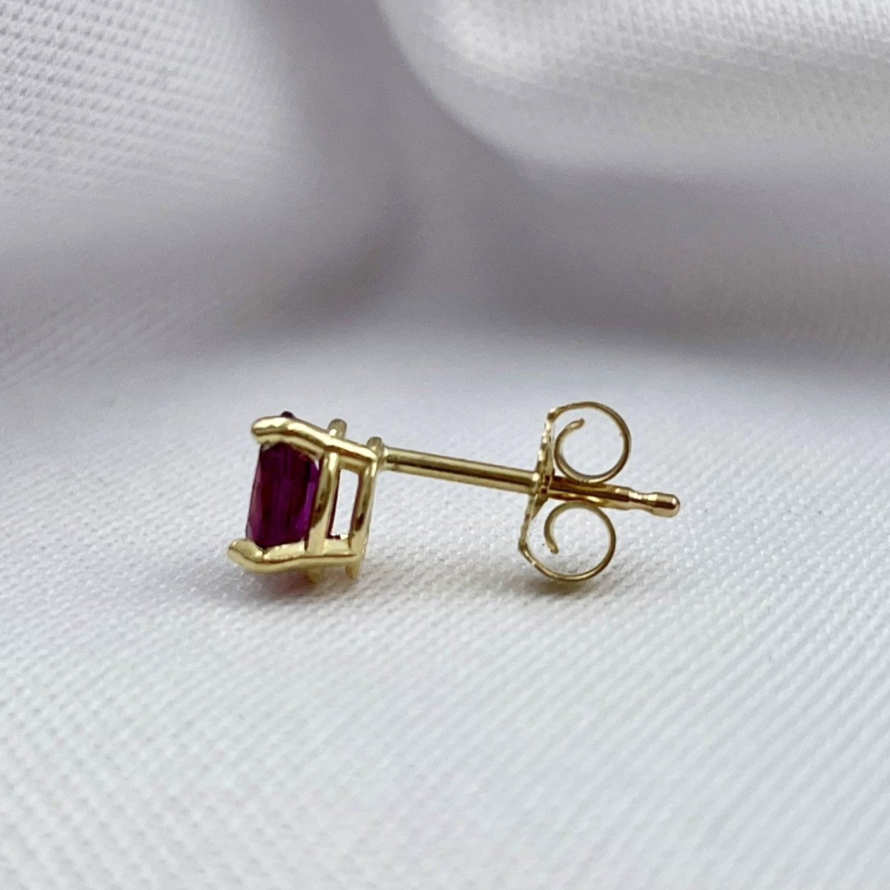 side view white background .92ctw Oval Ruby Solitaire Studs 14k Yellow Gold