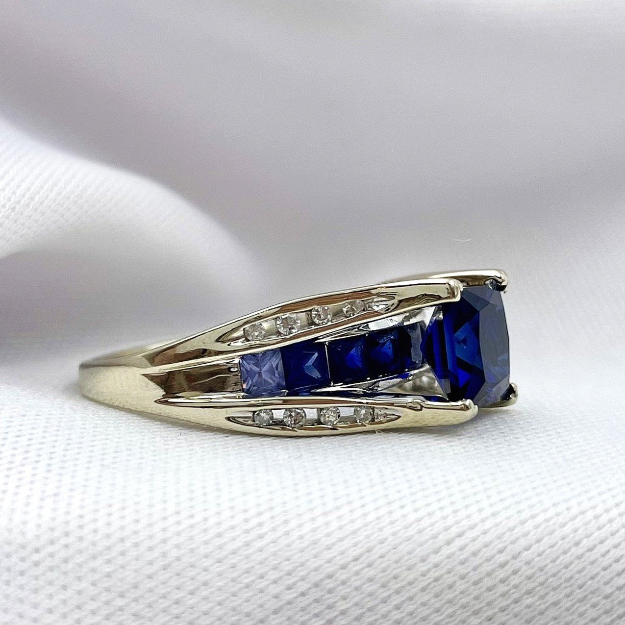 side view white background Synthetic Princess Cut Sapphires 10k White Gold Ladies Ring