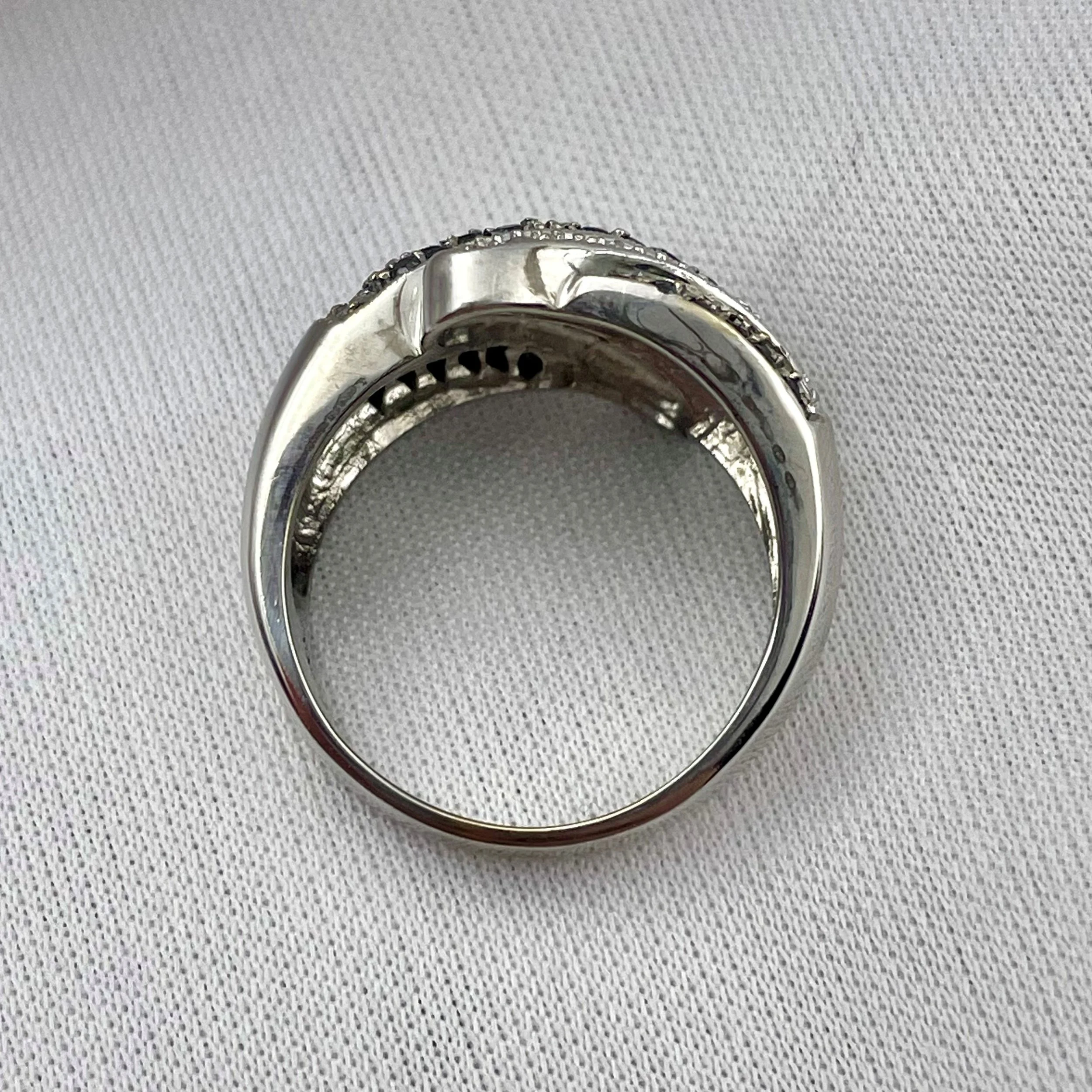 top down view of showing the depth of 1.00ctw Black And White Diamond Fashion Wide Ladies Ring 14k White Gold with white background