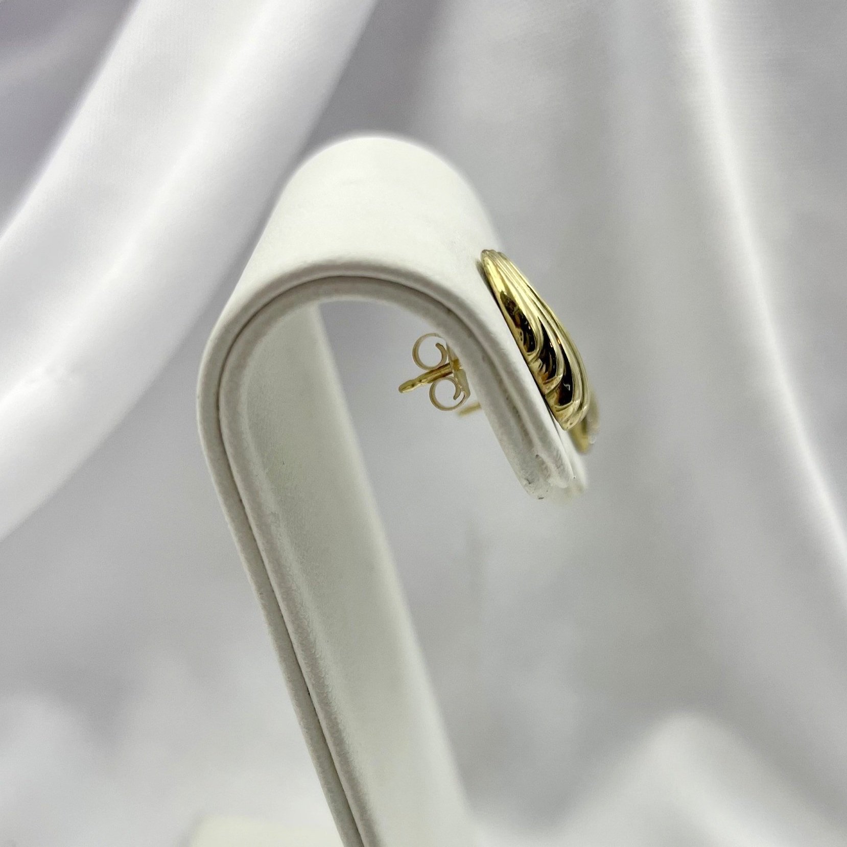 side view white background Fancy Swirl Diamond Earrings 14k Yellow Gold