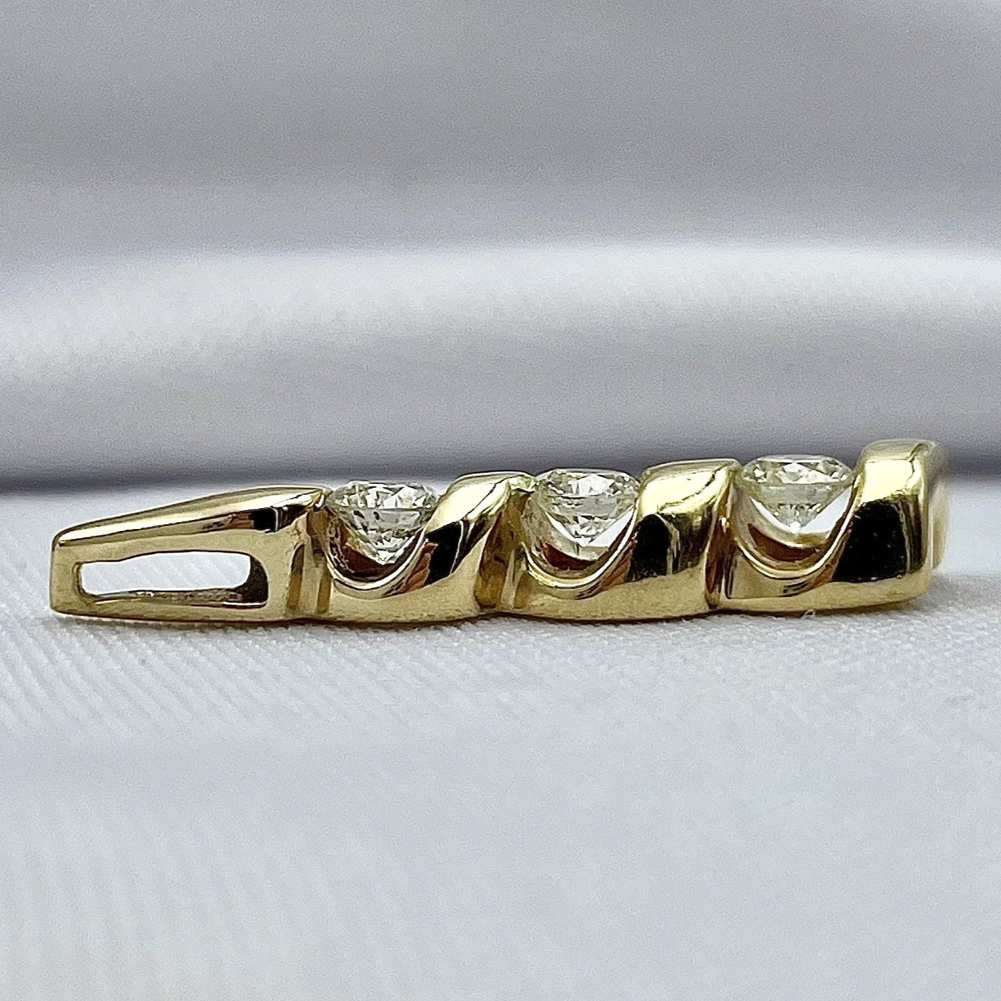 side view white background 1/2ctw A+ Quality Three Stone Diamond Twist Pendant 14k Yellow Gold