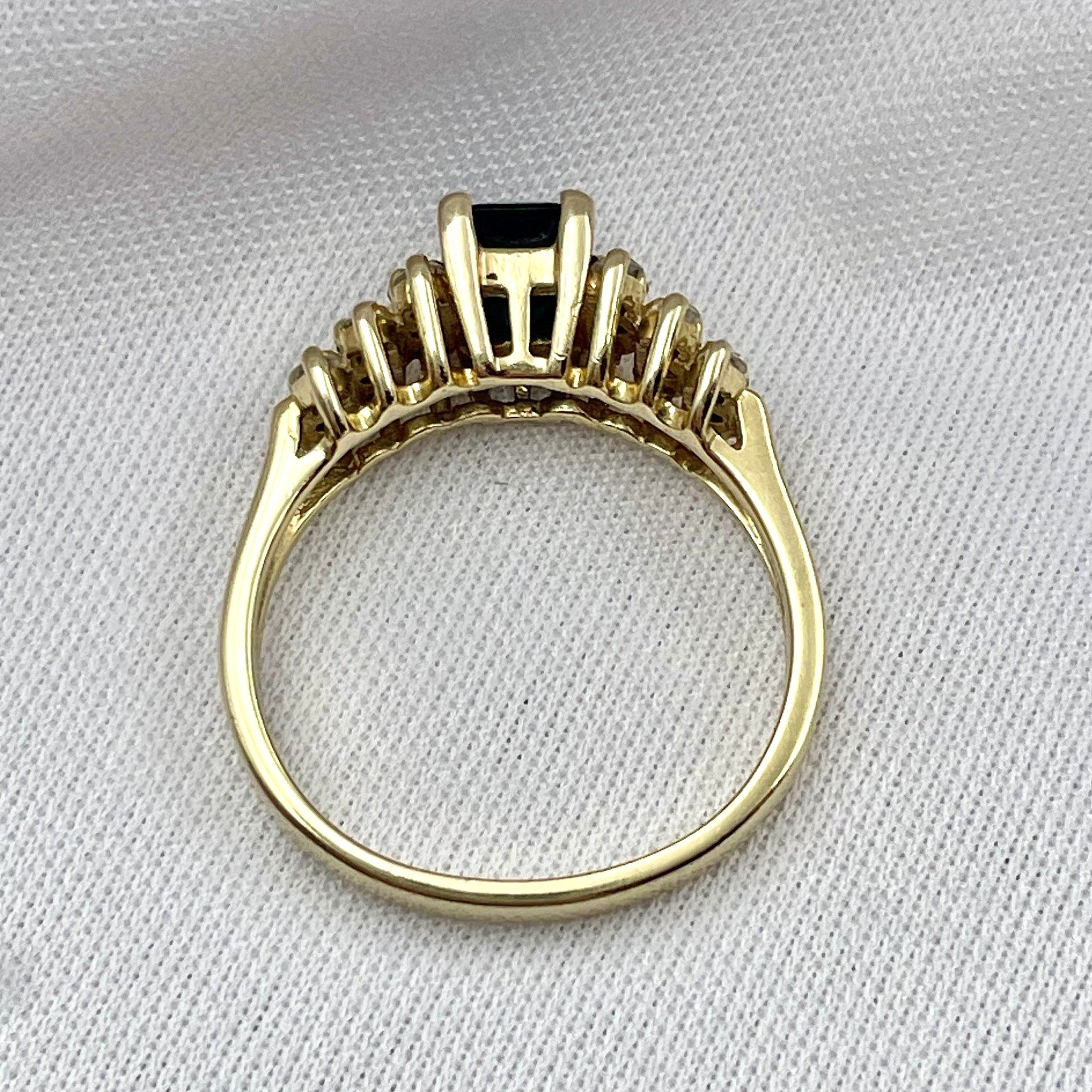 top down gallery view white background Emerald Cut Sapphire With Diamond And Sapphire Accents Ladies Ring 14k Yellow Gold