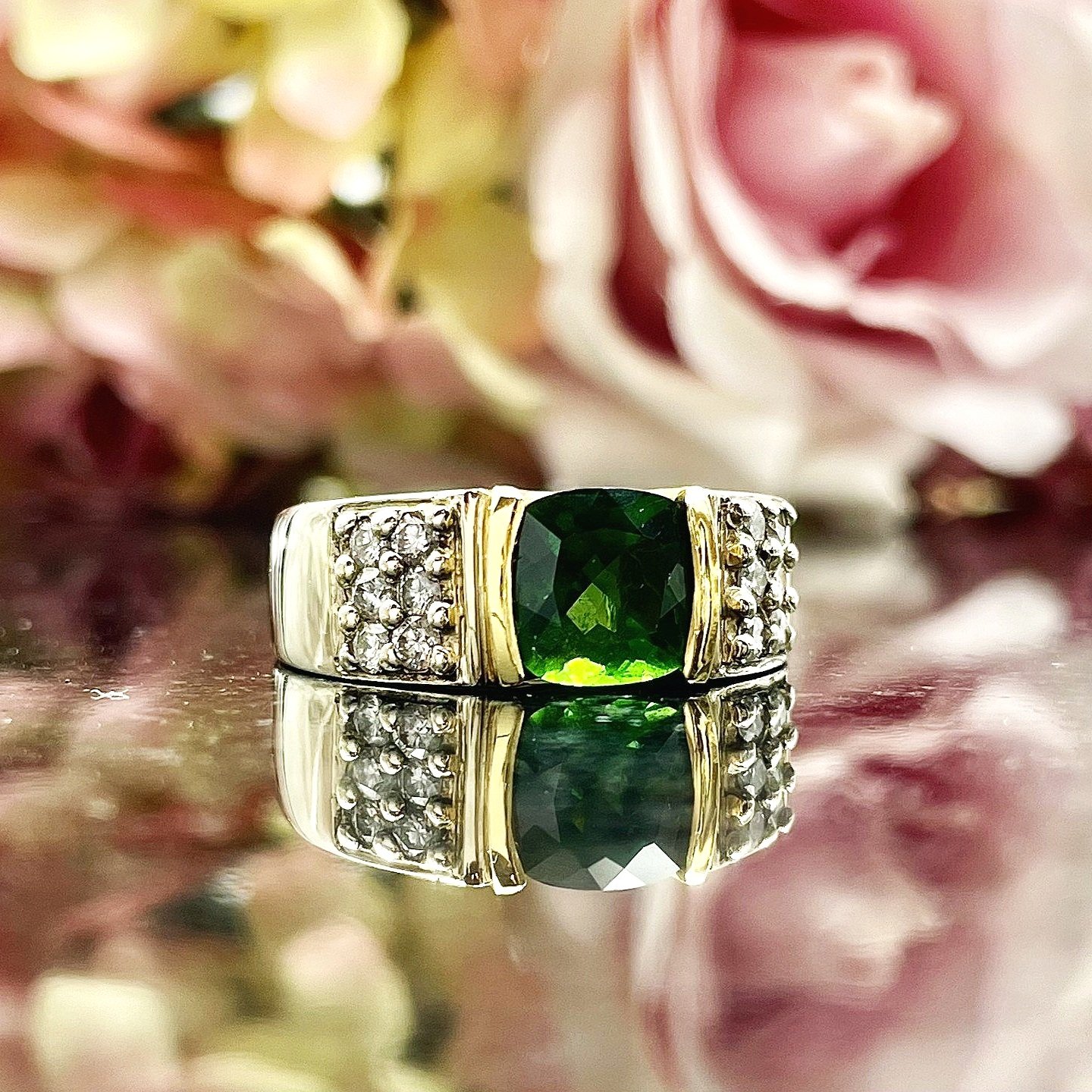 close up in front of flowers 1.76ct Cushion Cut Tourmaline With Diamond Accents 14k Two Tone Ladies Ring