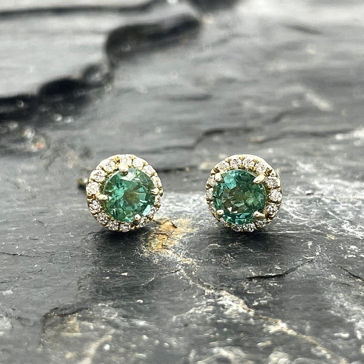14k Yellow Gold .93ctw Emerald and Diamond Halo Studs