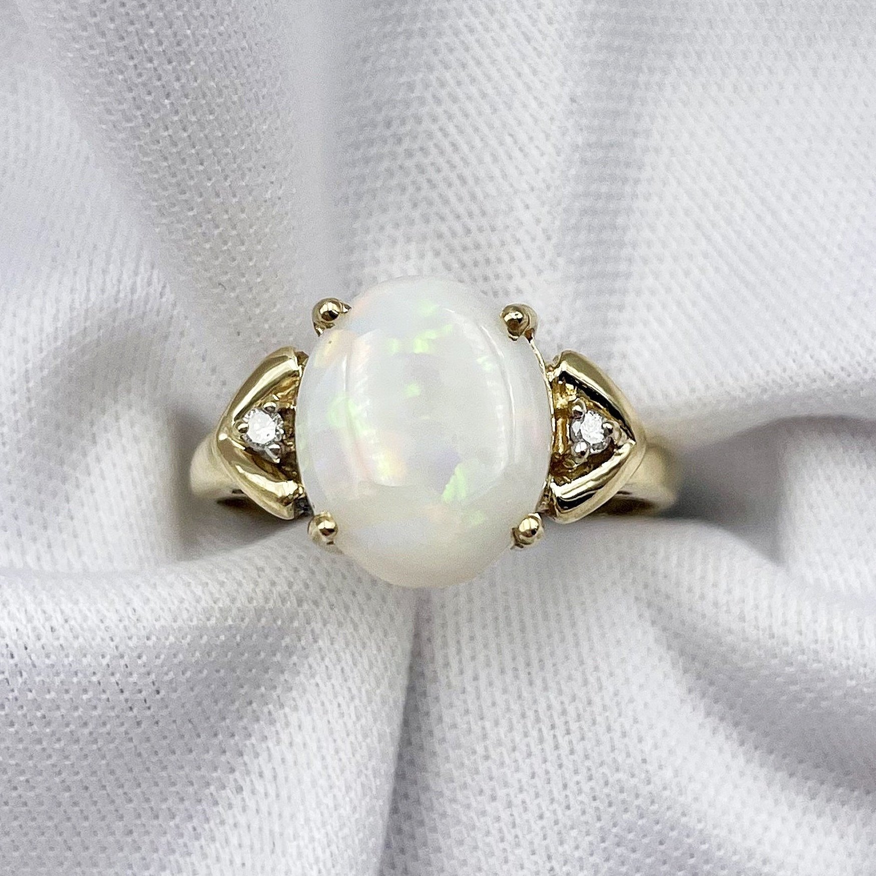 top down white background 14k Yellow Gold Oval Opal With Diamond Accent Ladies Ring