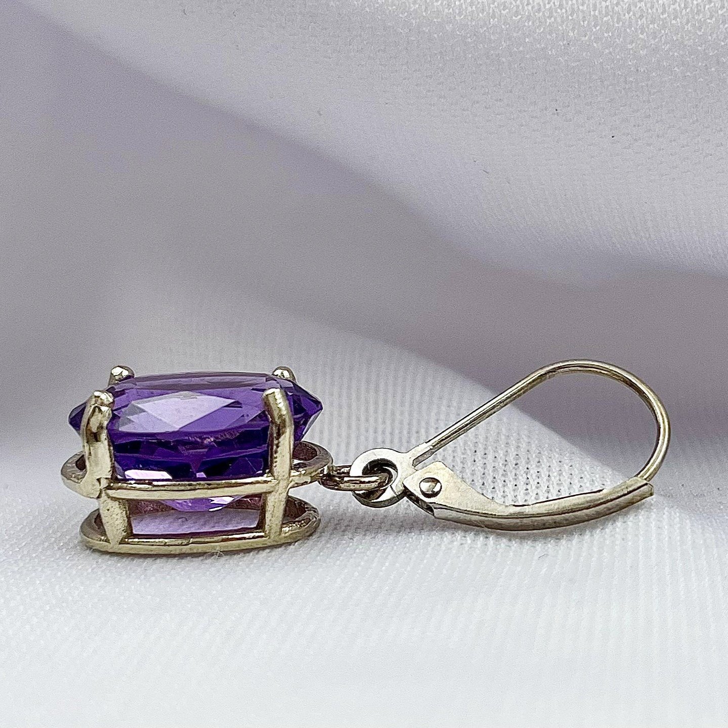 side view white background 12x10mm Oval Cut Amethyst Drop Earrings 14k White Gold
