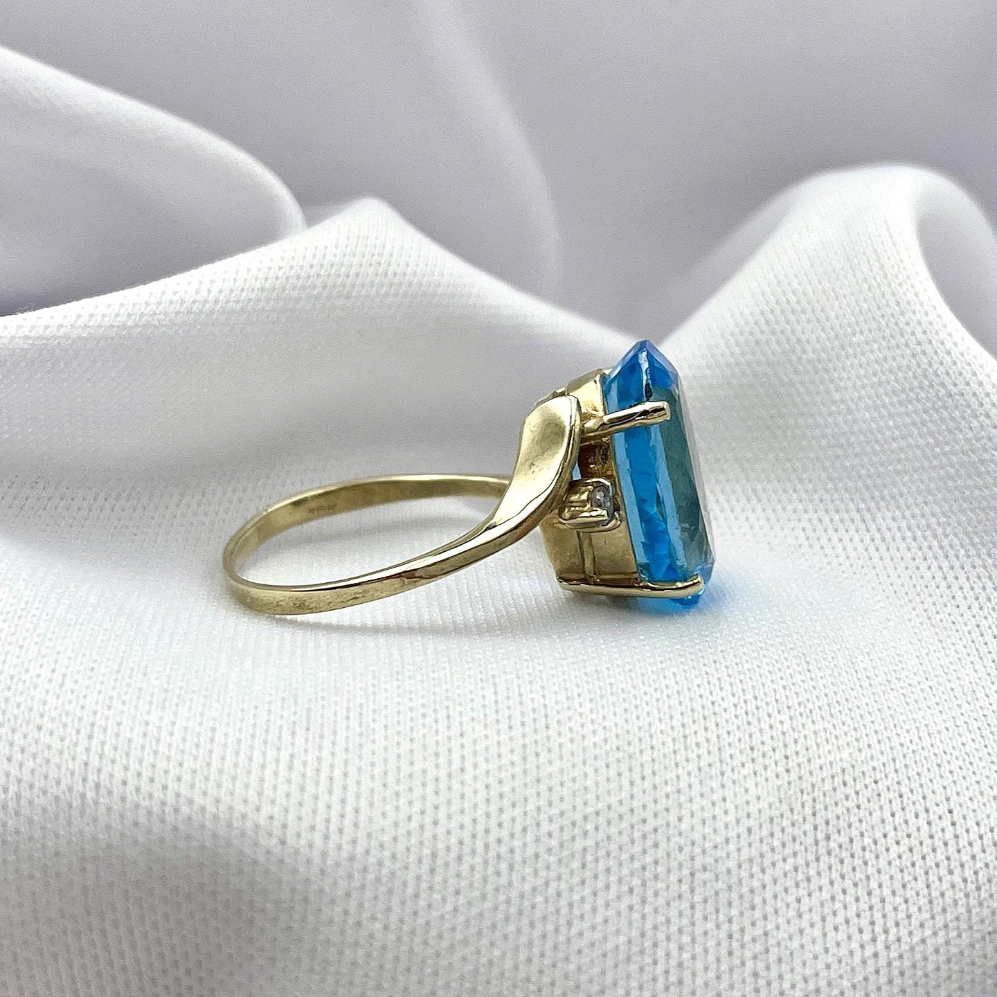 side view white background 14k Yellow Gold Bypass Topaz And Diamond Ladies Statement Ring