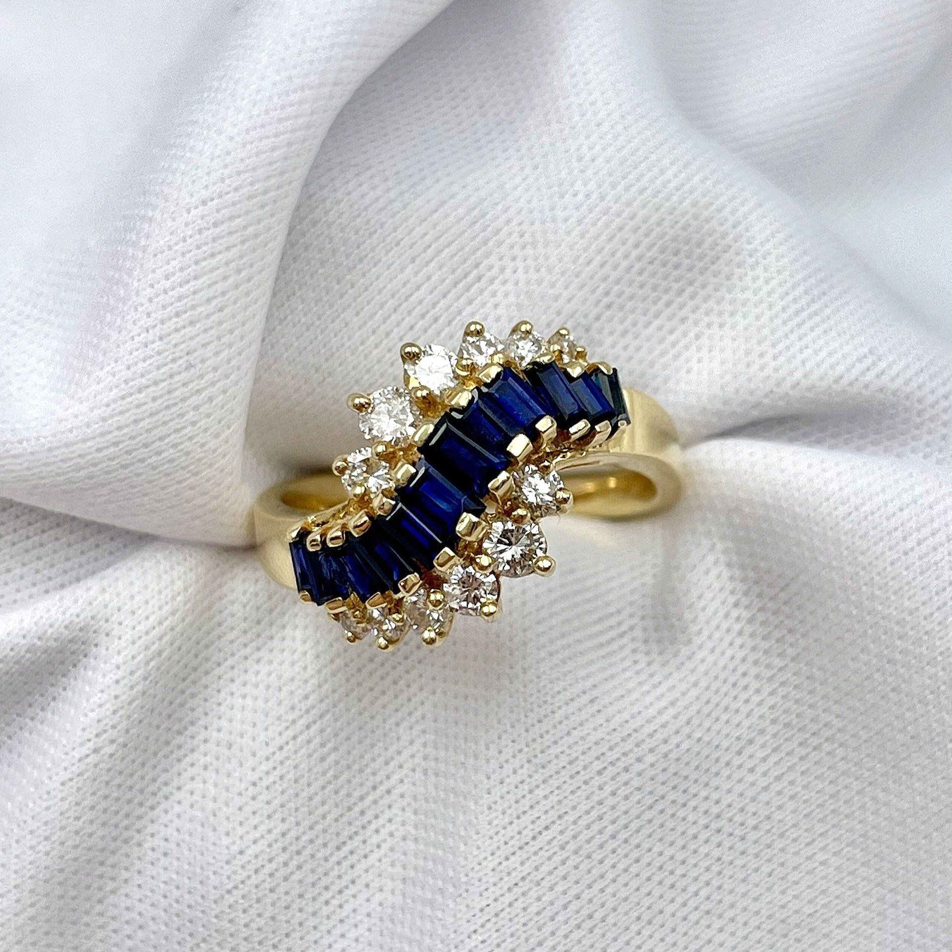 top down view white background Unique Sapphire And Diamond 14k Yellow Gold Ladies Ring