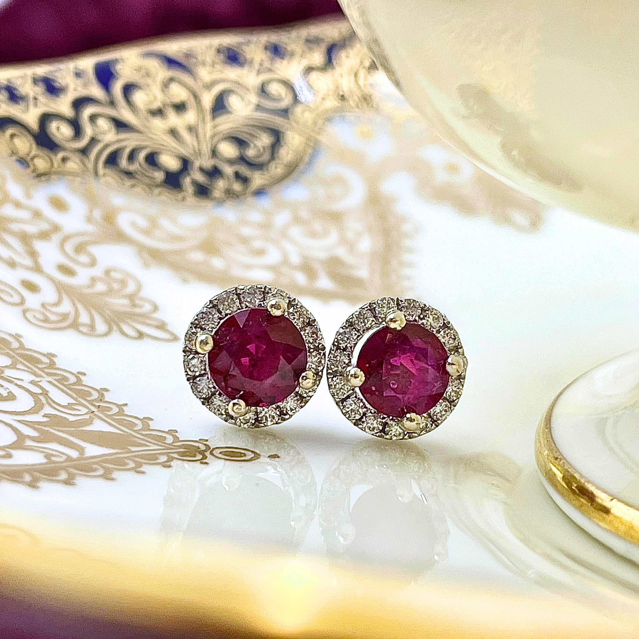 1.31ctw Rubies With .24ctw Diamond Halos Stud Earrings in 14k White Gold