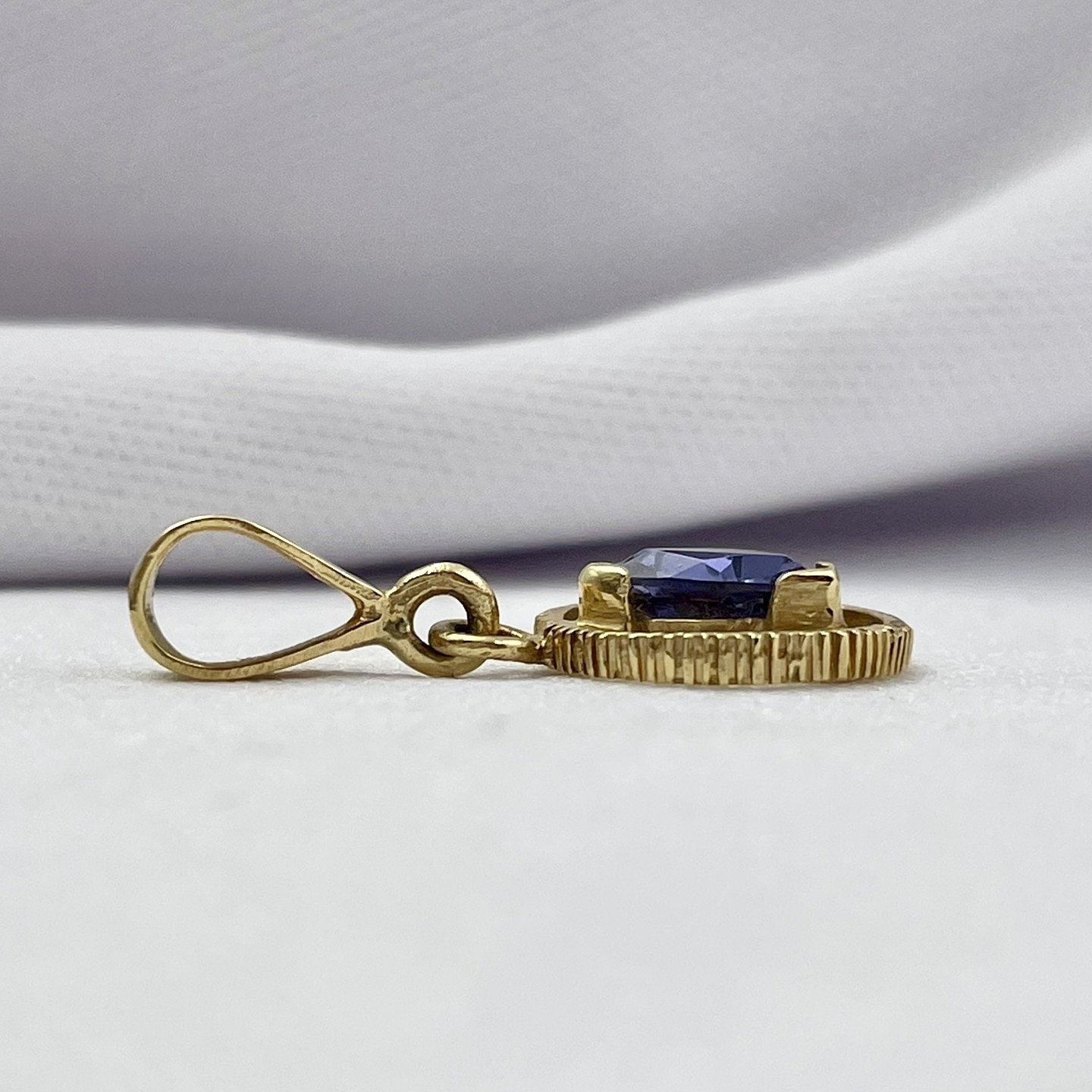 side view white background Trillion Cut Iolite AA Pendant 14k Yellow Gold