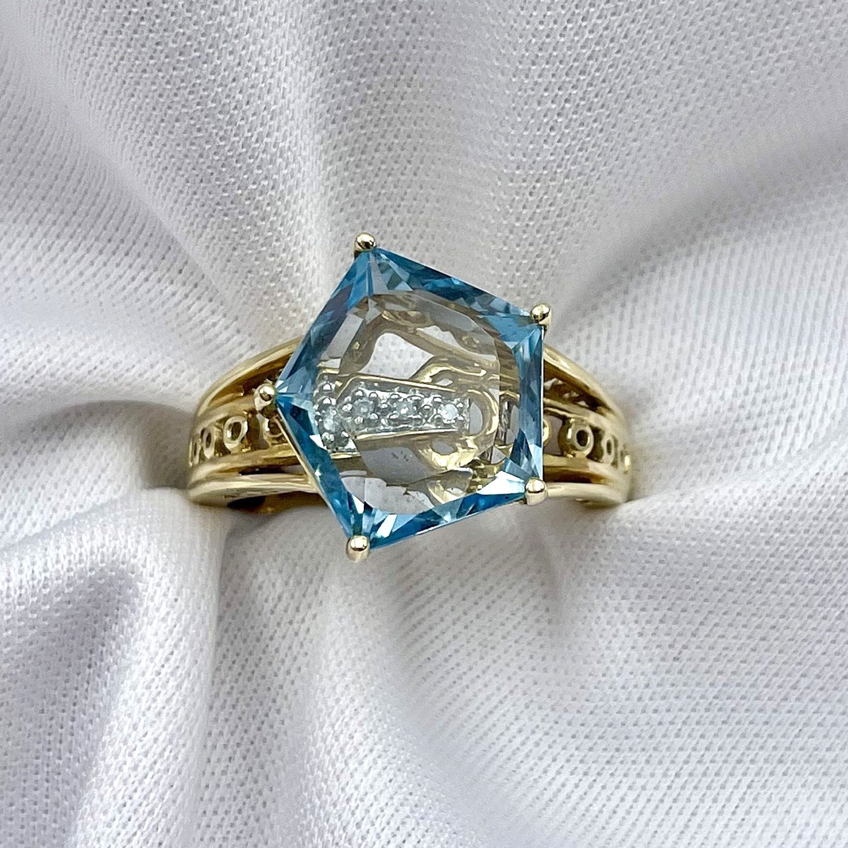 top down view white background Fancy Pentagon Cut Blue Topaz With Diamond Accent Ladies Ring 14k Yellow Gold