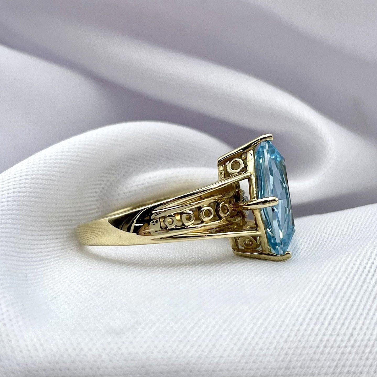 side view white background Fancy Pentagon Cut Blue Topaz With Diamond Accent Ladies Ring 14k Yellow Gold