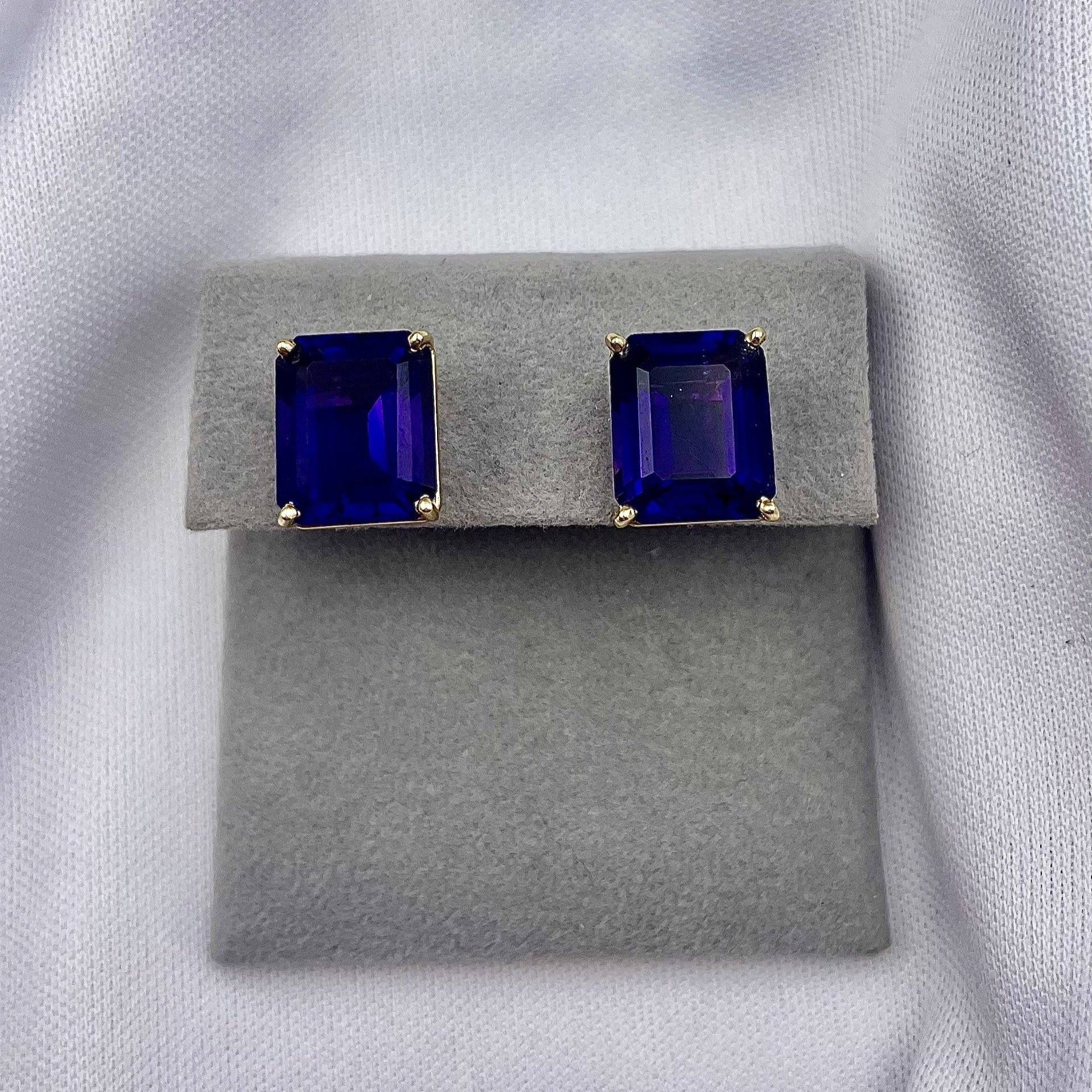 top down white background 14k Yellow Gold Emerald Cut Amethyst Stud Earrings