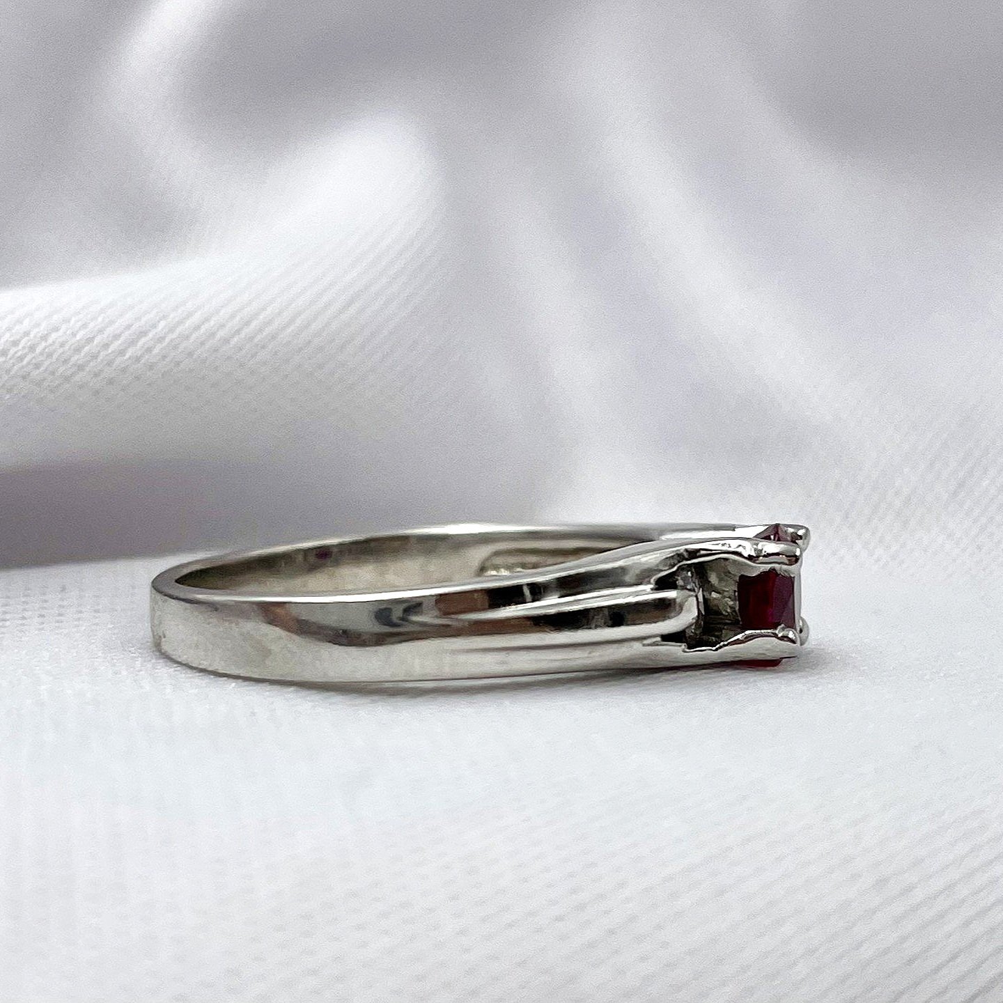 side view white background .63ct Ruby With 1/5ctw Diamonds Three Stone Ring 14k White Gold